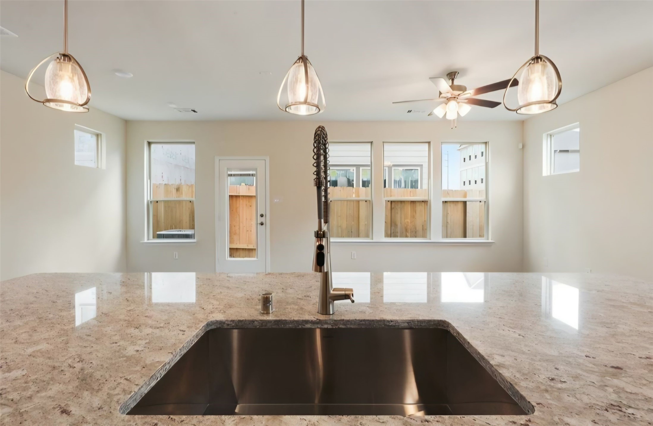 Kitchen island has built in large functional undermount sink