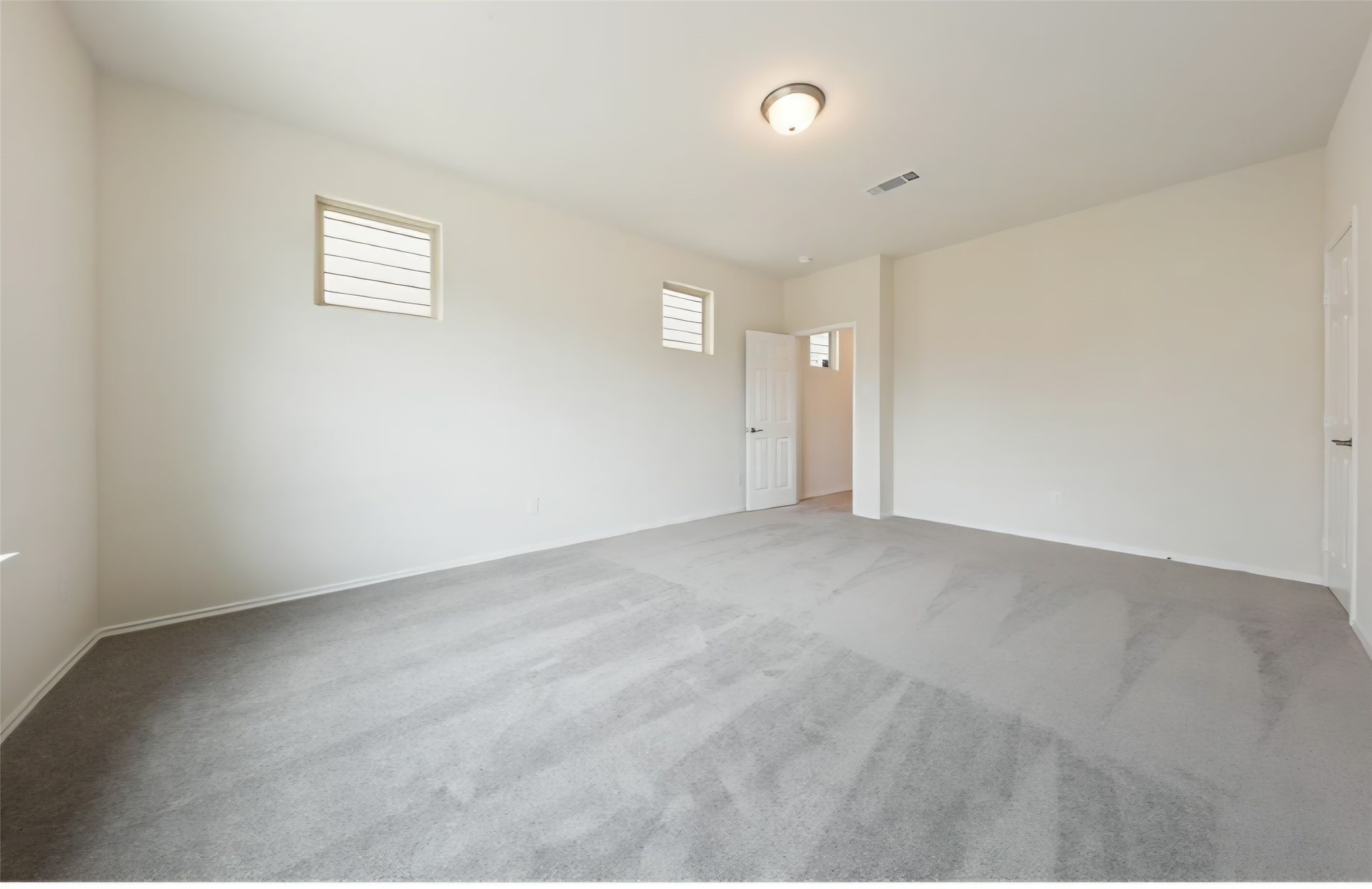 Another angle of the large primary bedroom