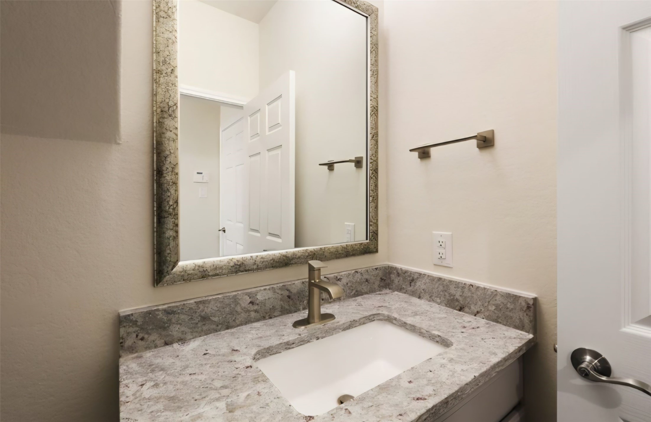 Downstairs powder 1/2 bath, great for guests and just very practical