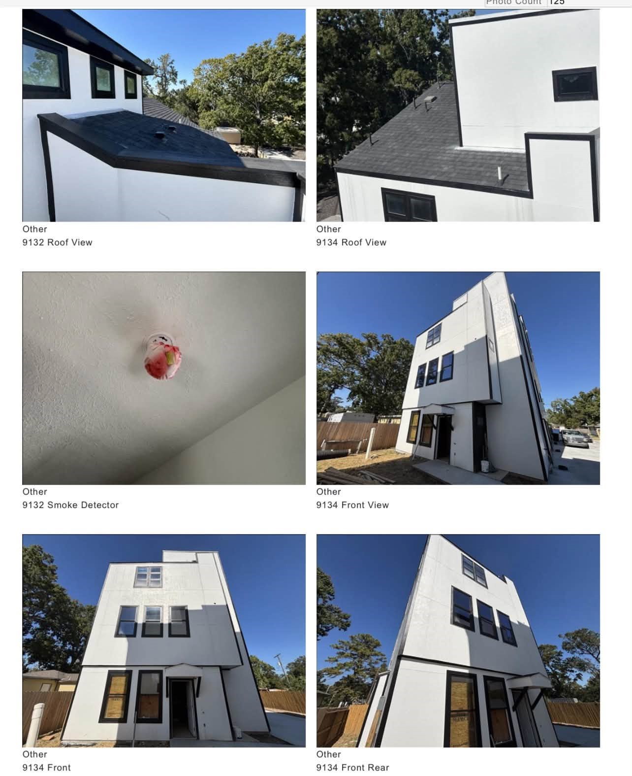 High-angle view highlighting modern roofline geometry, upper-level exterior finishes, and front profile of the single townhome.