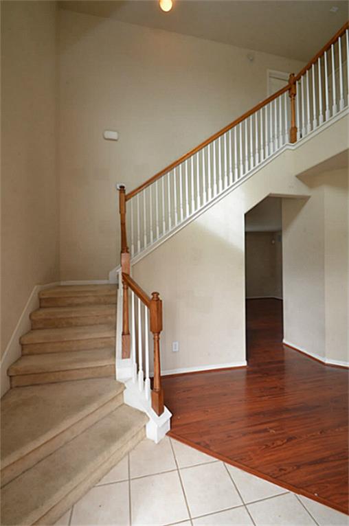 Experience the airy elegance of this home with its impressive high ceilings, creating a spacious and inviting atmosphere.