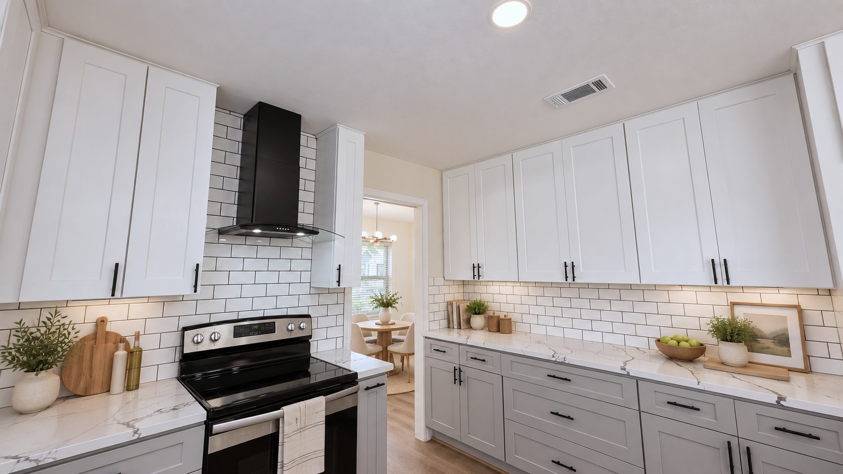 Virtually staged: Modern kitchen styling brings out the clean white-and-black design and functional workspace.