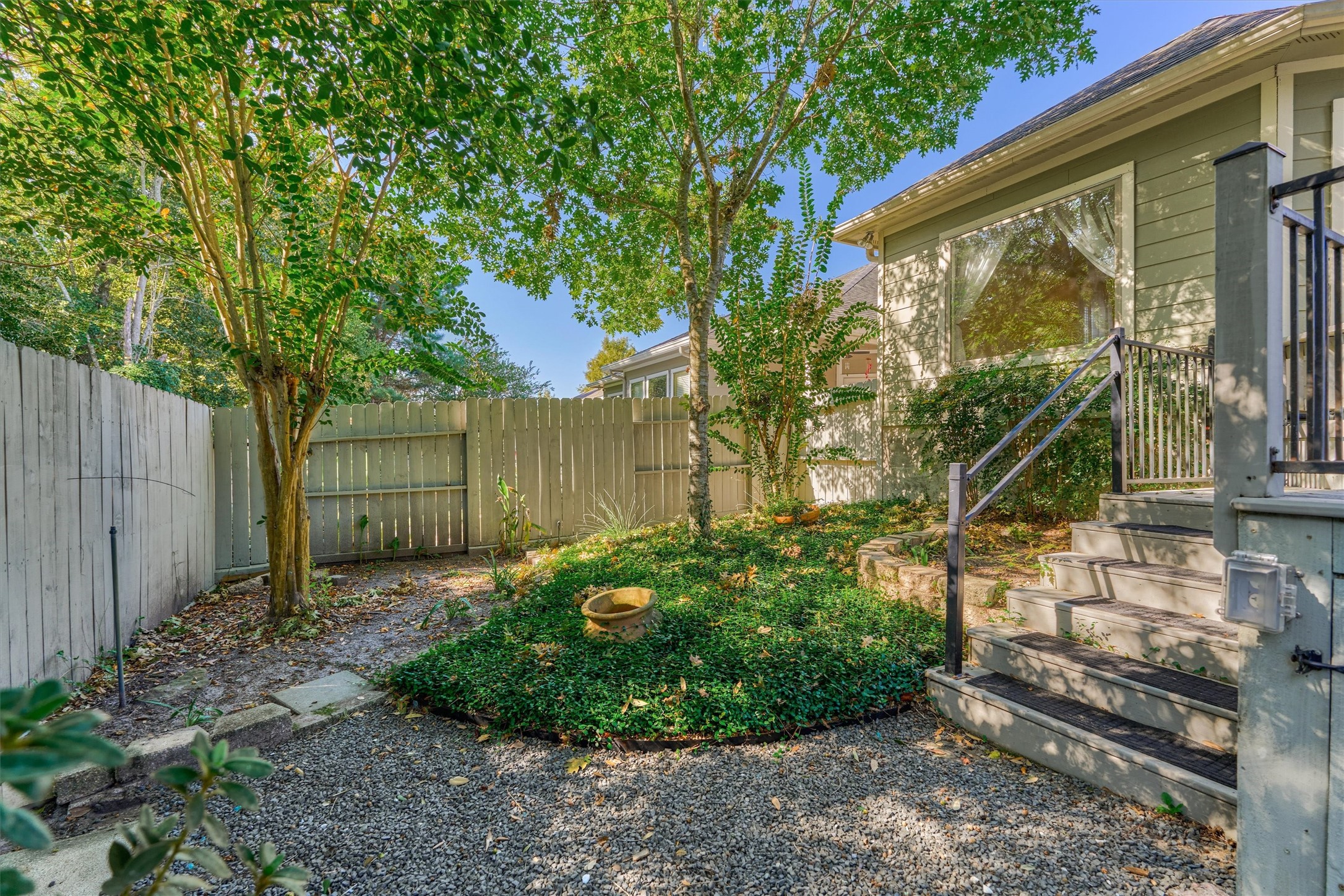 Mature landscaping surround the property.