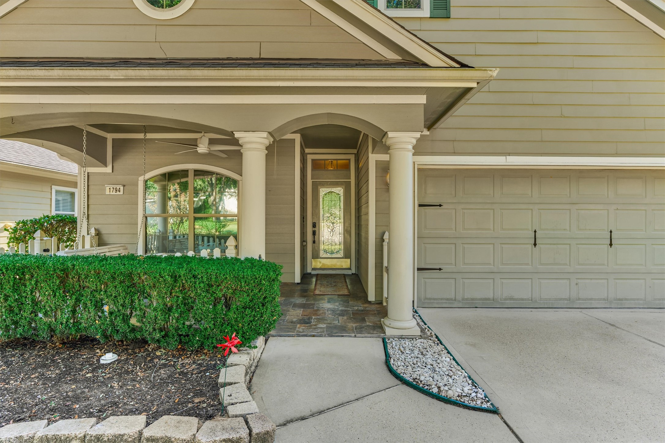 Covered porch entry. Covered porch entry.