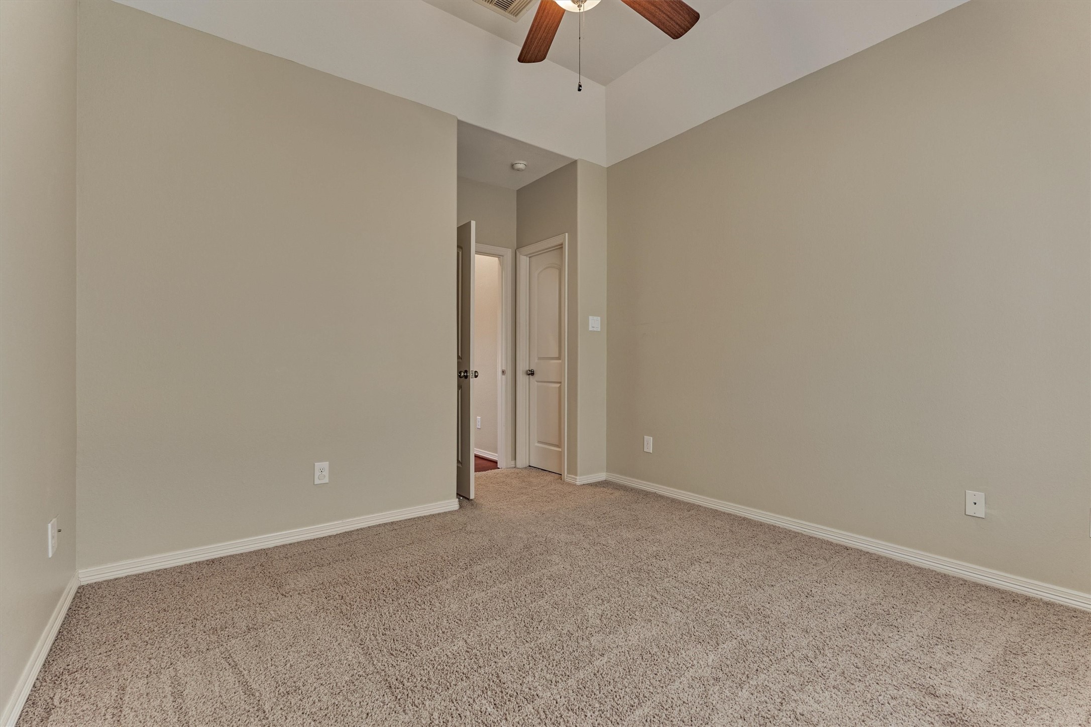 This room also features a spacious walk-in closet.