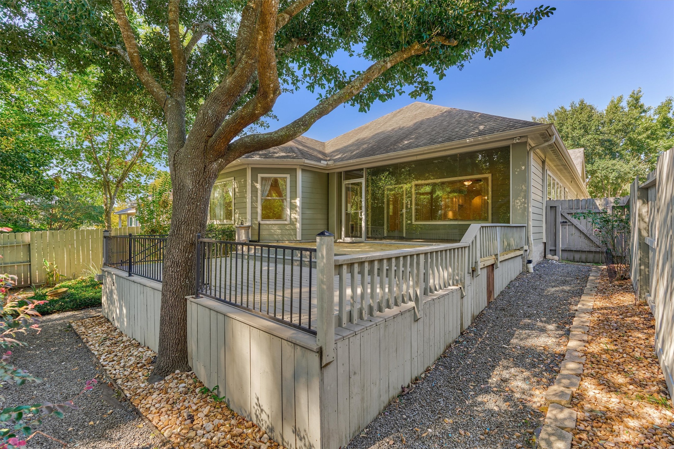 A mature tree provides plenty of shade on the deck.