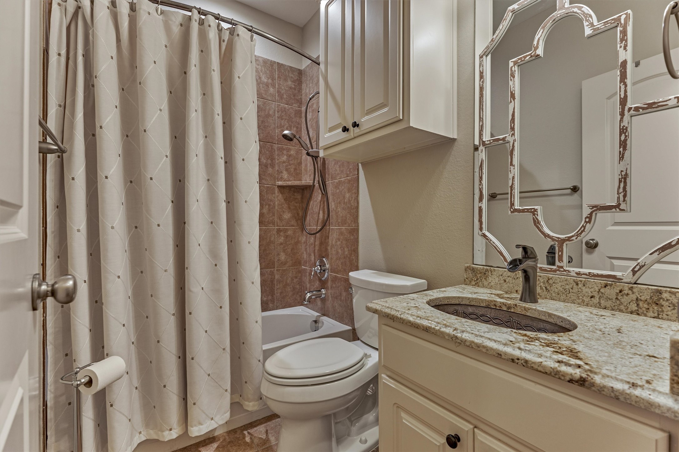Full bath with designer mirror and sink. Full bath with designer mirror and sink.