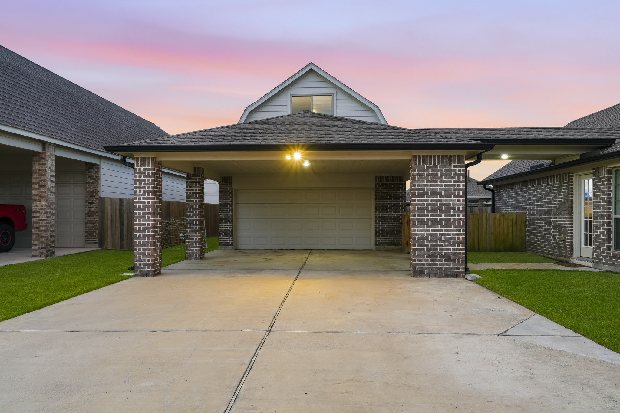 Covered Porte-cochere with light fixture.