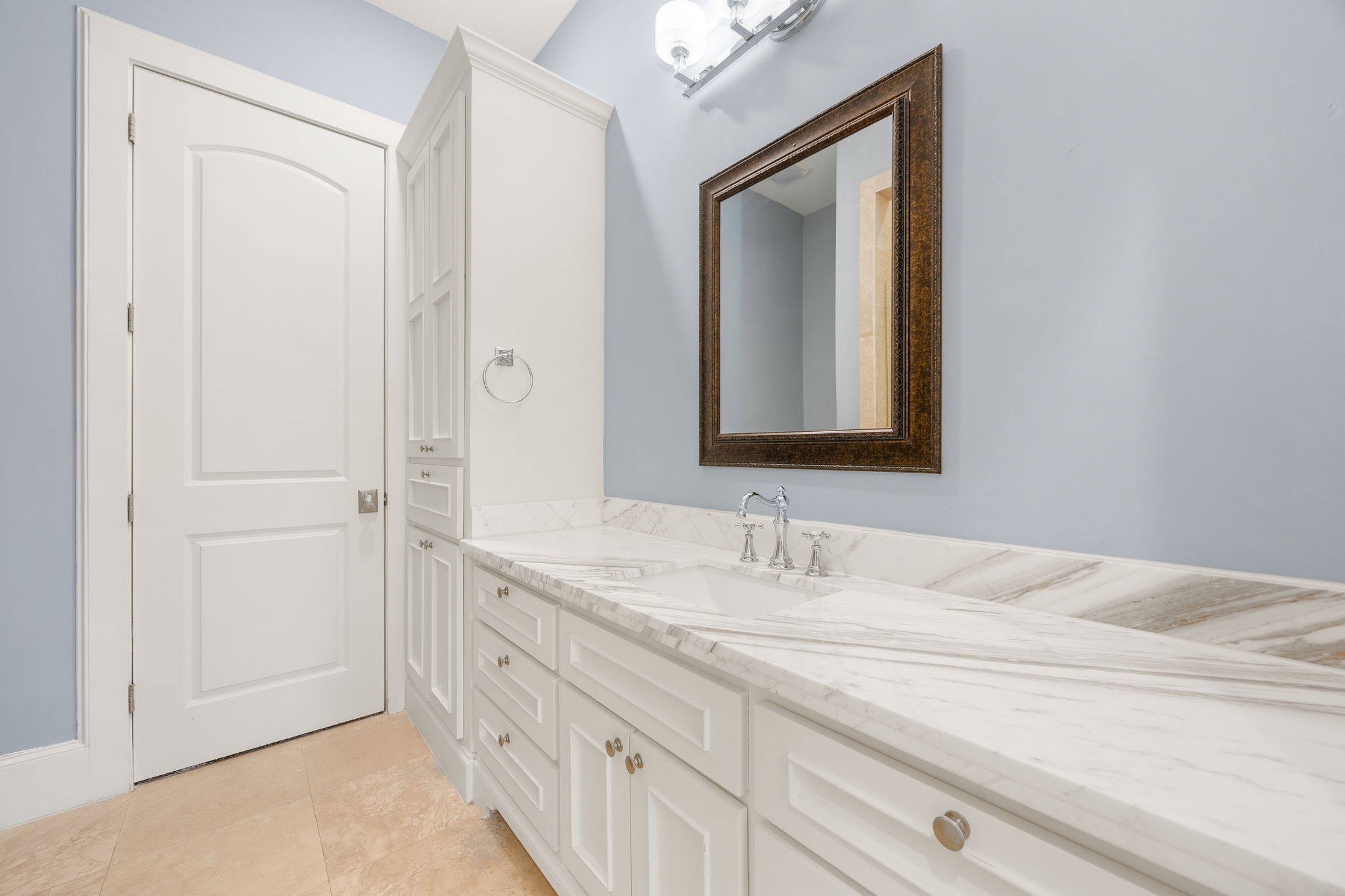 Your downstairs guest bedroom comes with the convenience of its own private full bathroom, offering family and overnight guests a little extra comfort and privacy.
