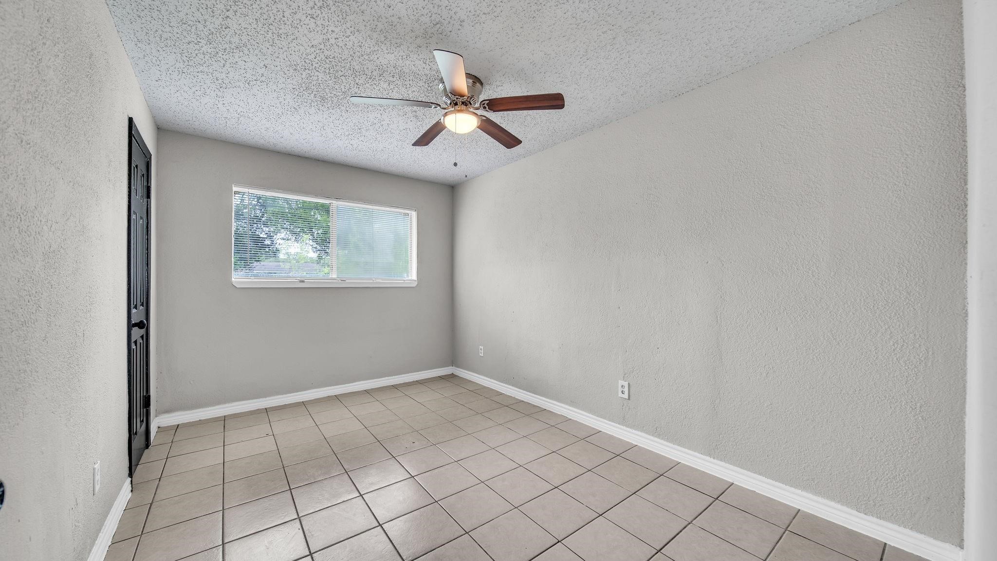 Conveniently located just off the entry, the fourth bedroom enjoys views of the front yard and offers exceptional flexibility. Equally suited as an elegant home office, private guest retreat, or inviting reading room, this space can easily be tailored to complement your lifestyle.
