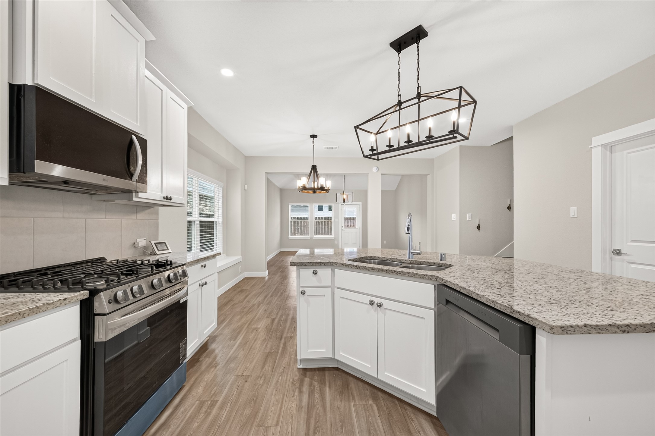 Gas cooking, ample counter space, and a practical kitchen layout make meal preparation convenient.