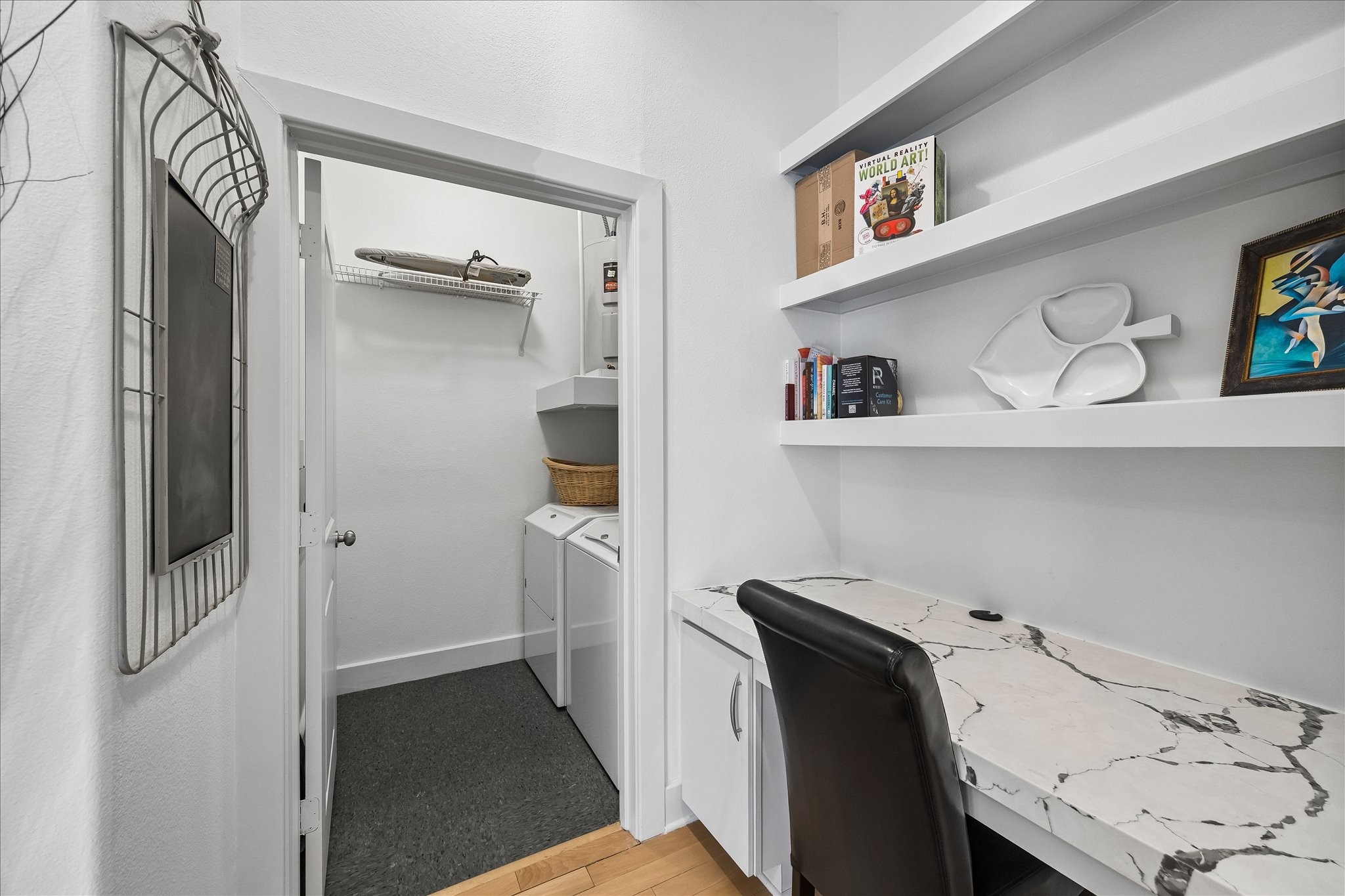 Dedicated built-in workspace with adjacent in-unit laundry.