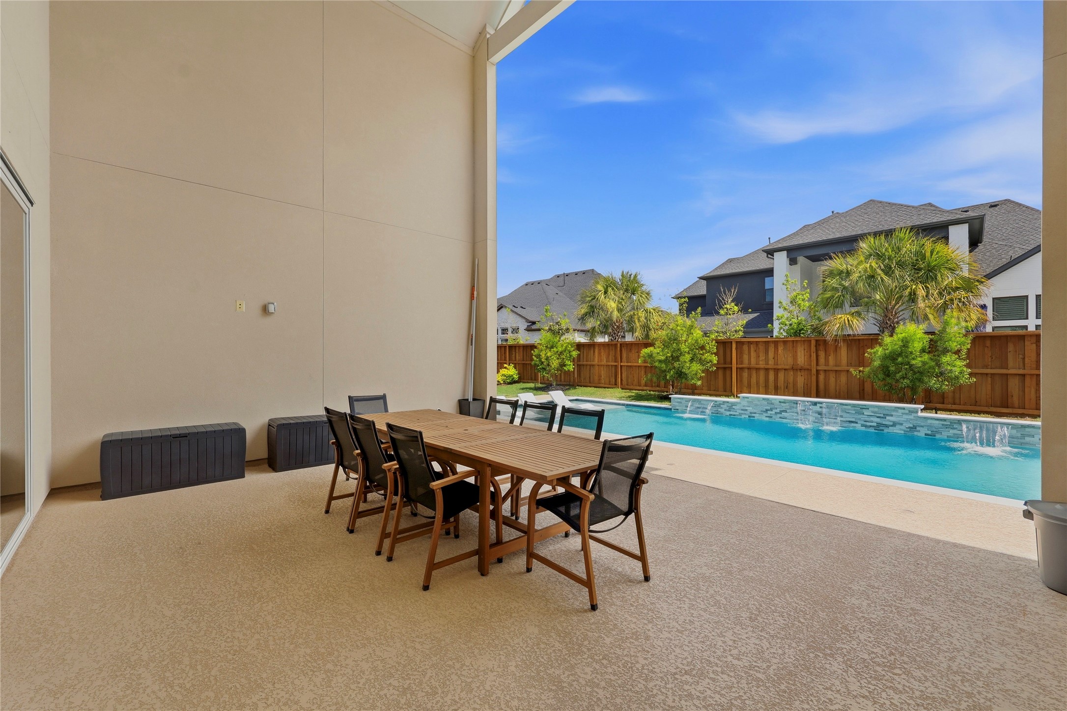 Sliding doors lead directly to your luxurious patio and pool!