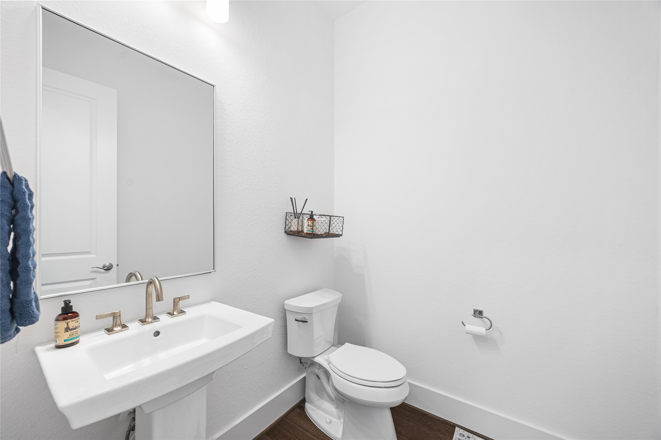 Powder restroom located near the study.