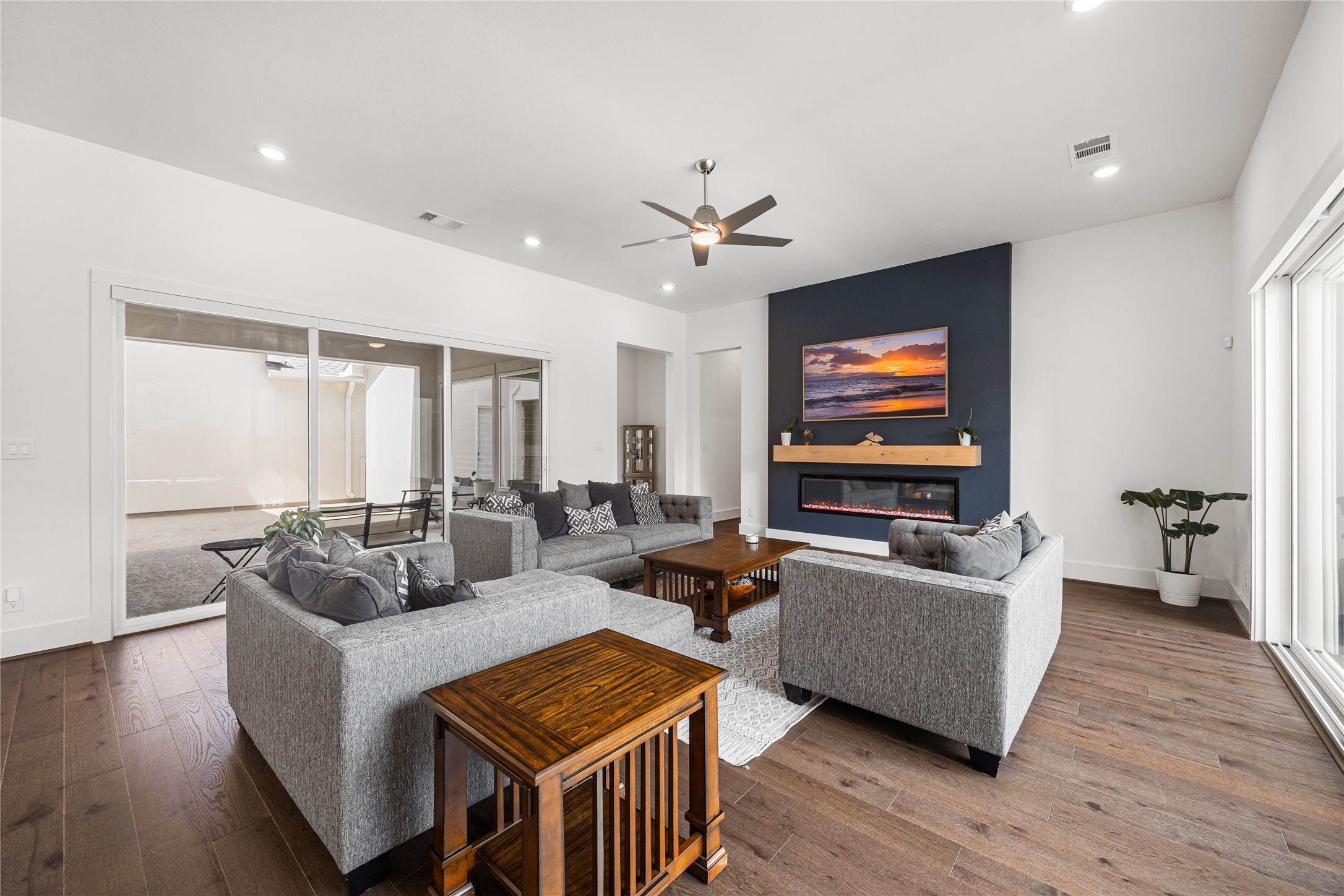 Both sliders open up in the main living area that is perfect for indoor/outdoor living.