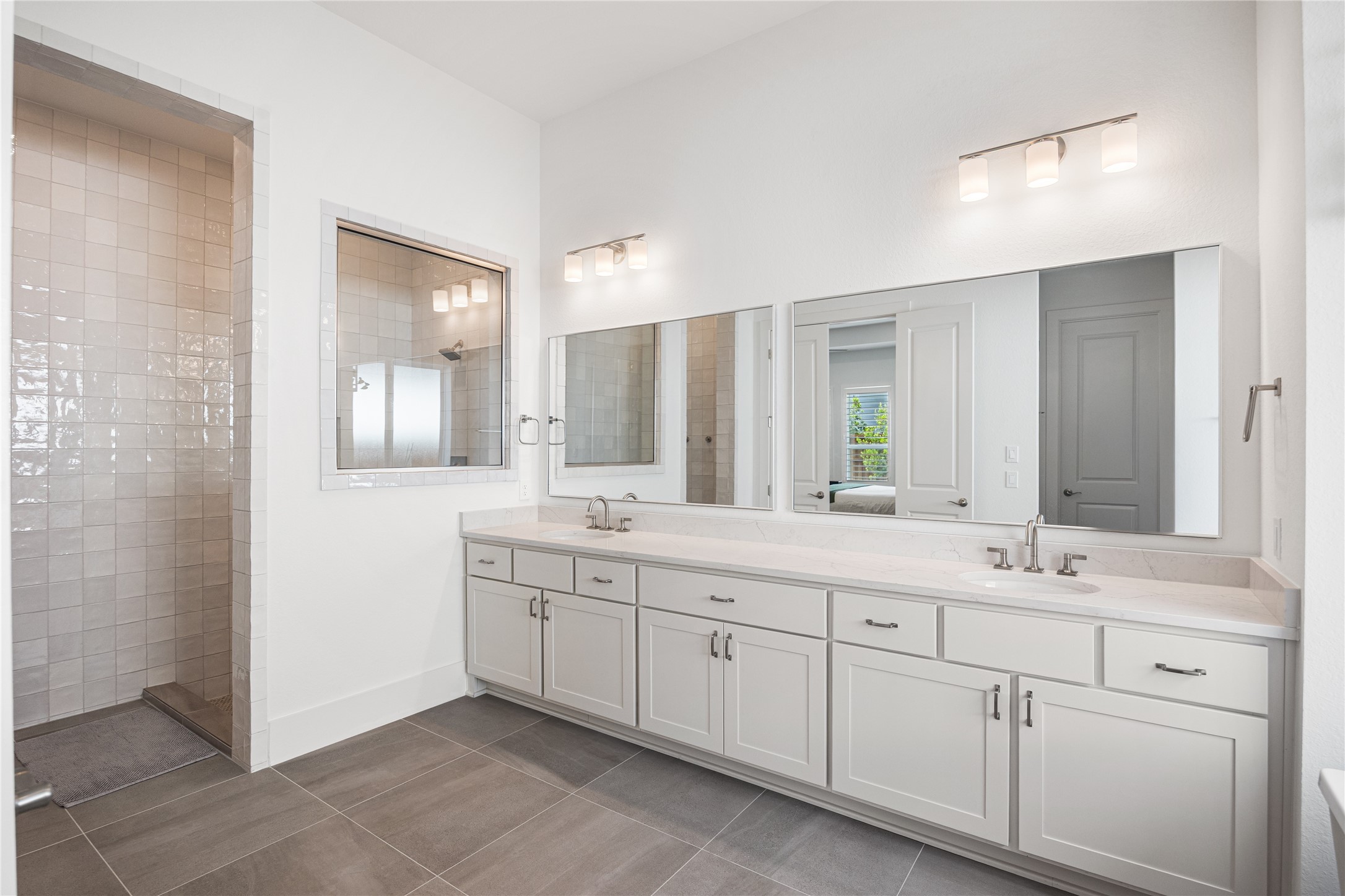 Elevated cabinetry in the primary bathroom.