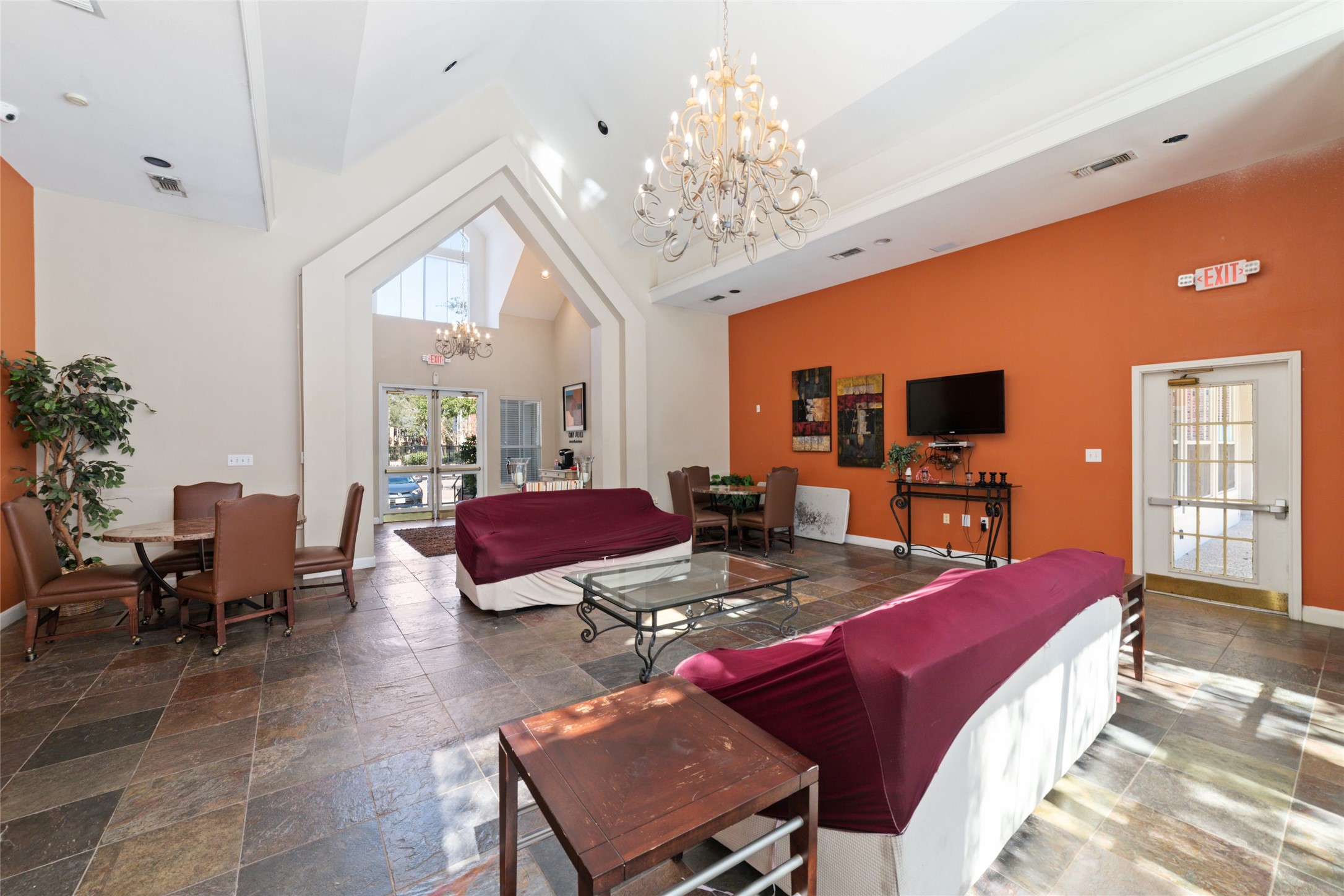Spacious clubhouse with stylish seating areasperfect for social gatherings, remote work, or relaxing.