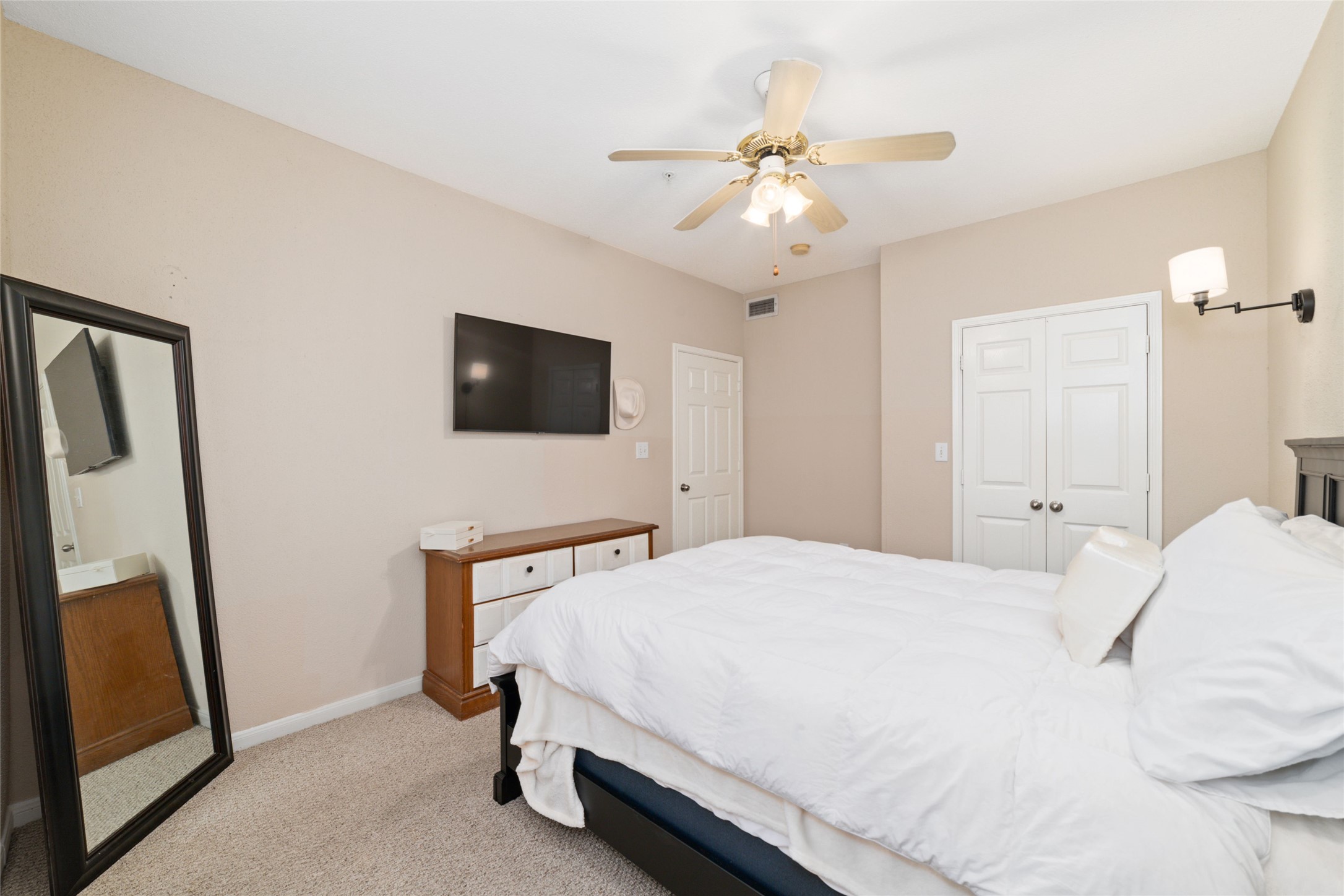 Massive Walk-In Closet  Thoughtfully designed with built-in shelving to maximize storage and organization.