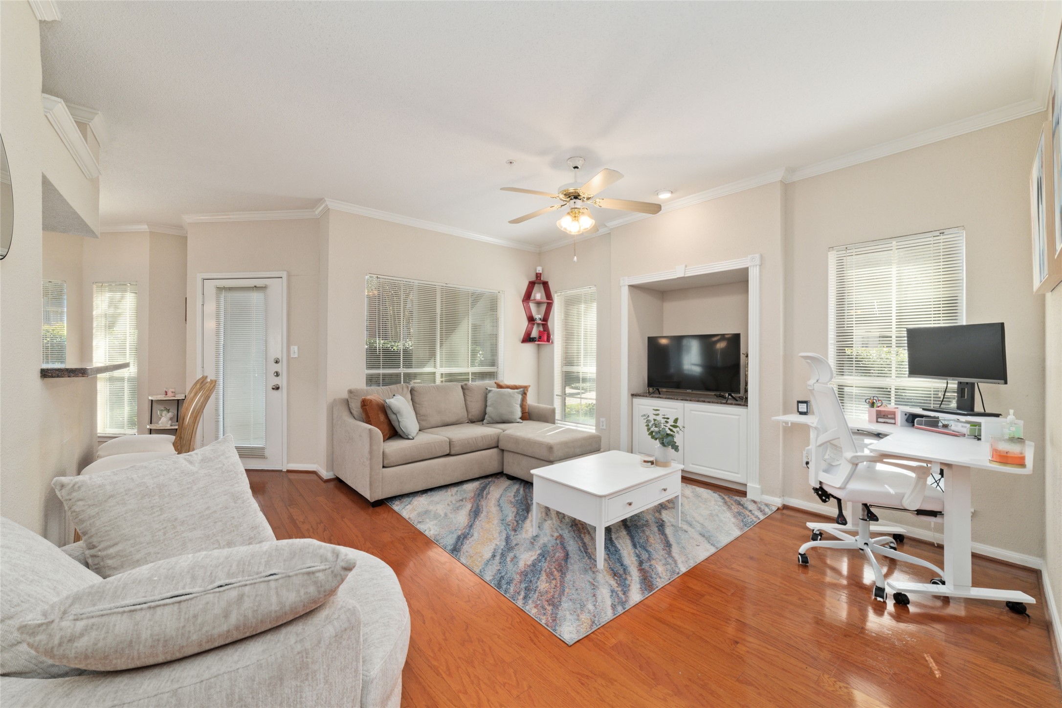 Natural Light Galore  Large windows fill the space with sunshine, creating a warm and inviting atmosphere.