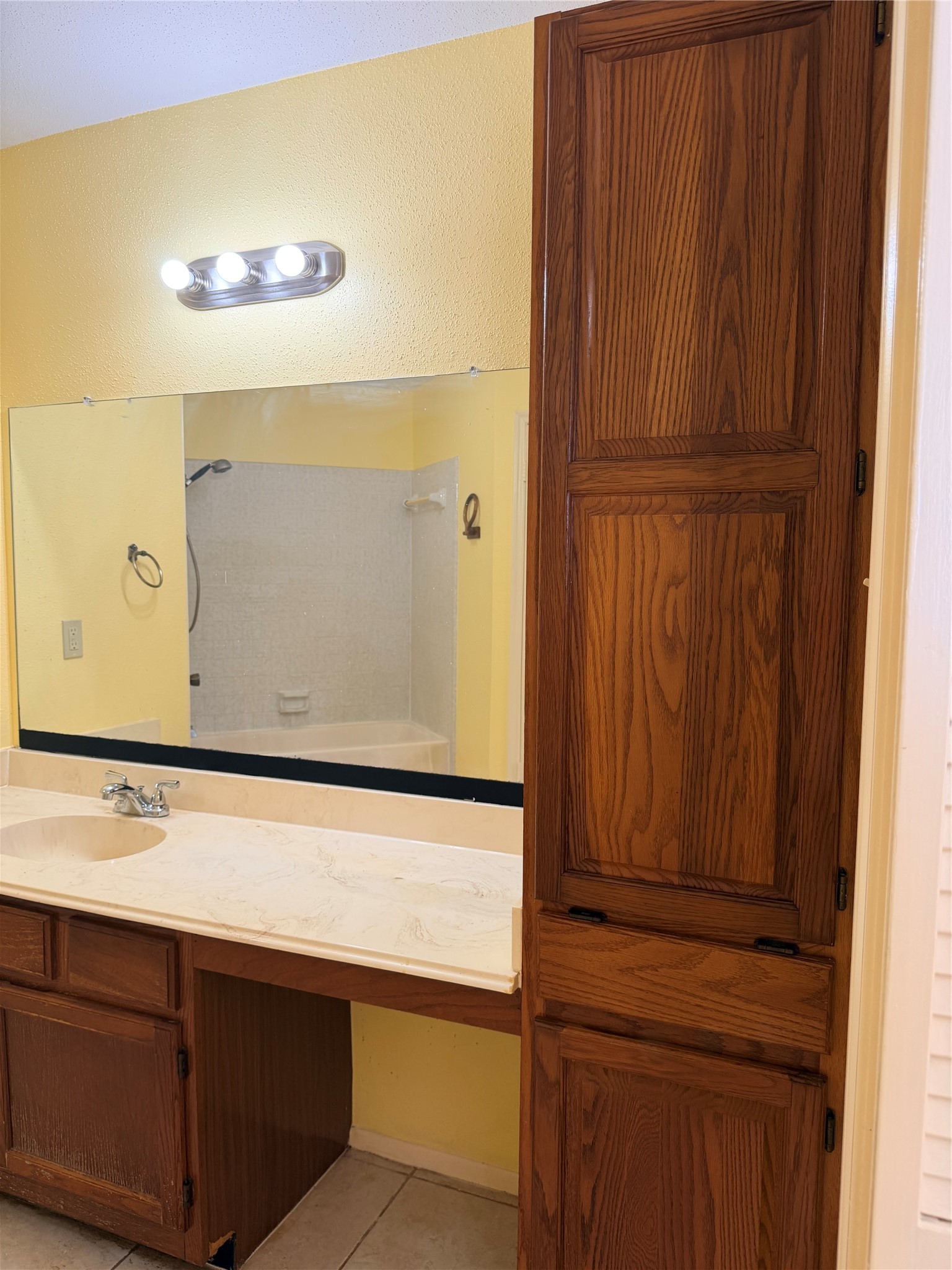 Master vanity and storage cabinet