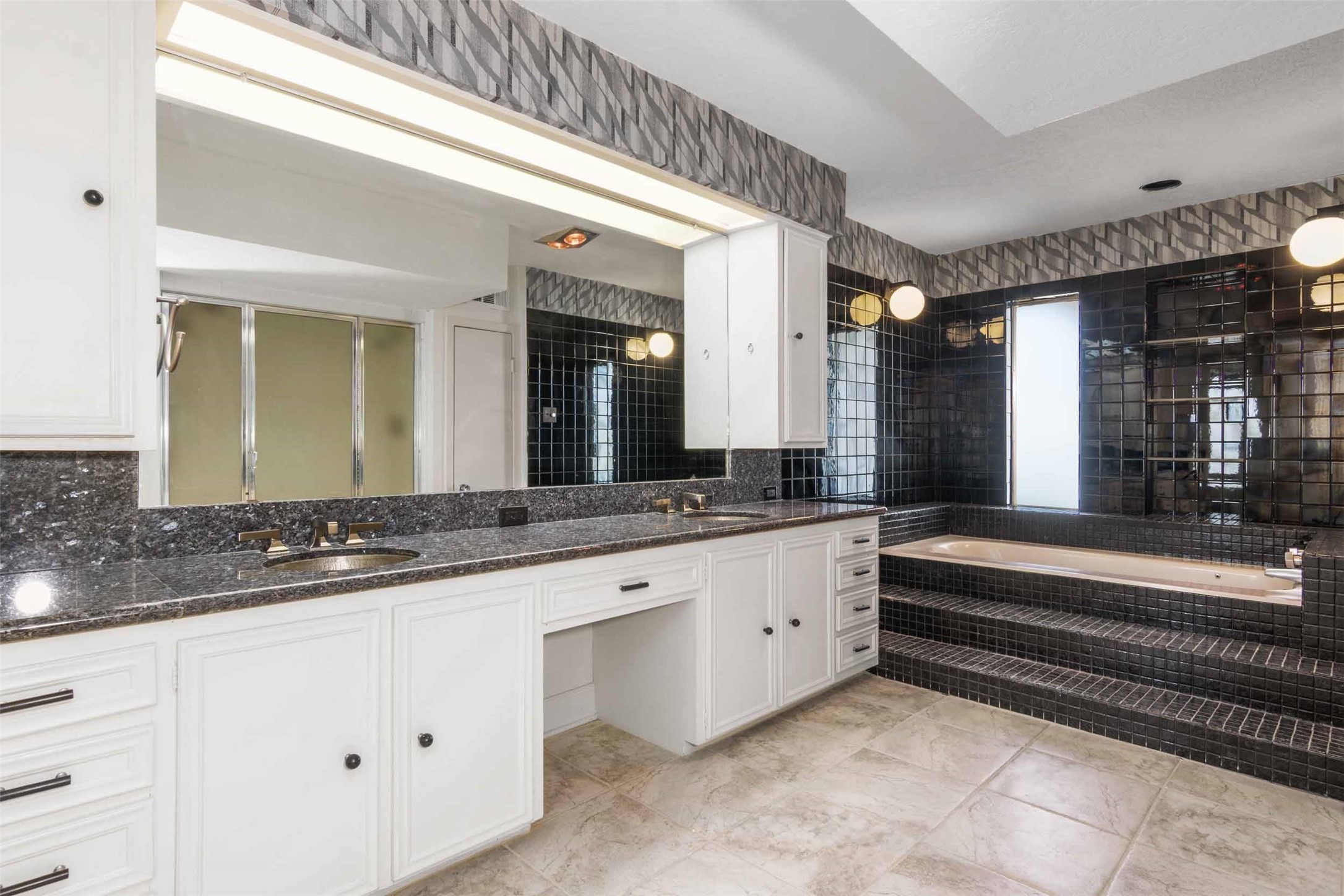 Impressive Primary bathroom.