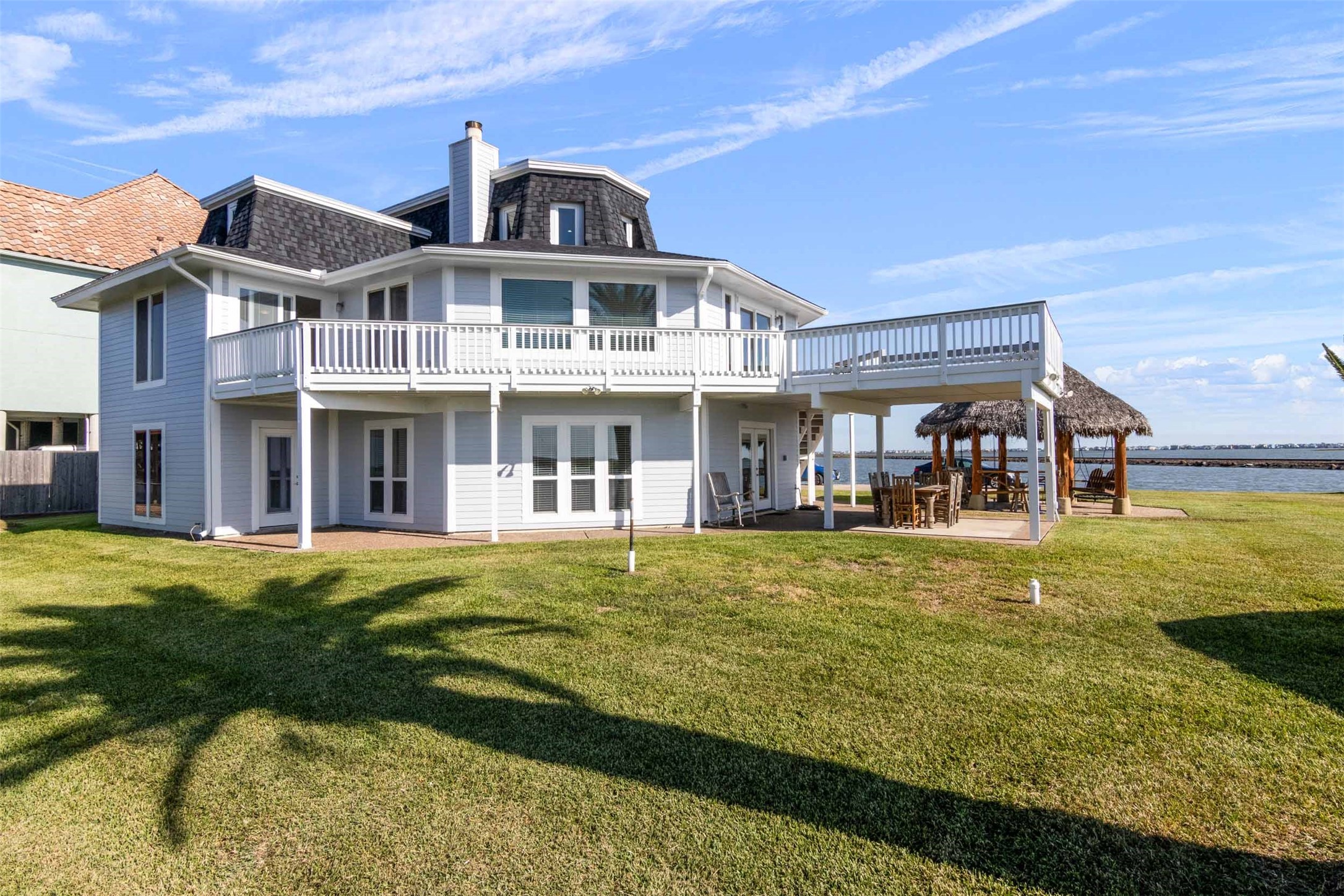 This home was designed to accentuate the views with many windows and French doors.
