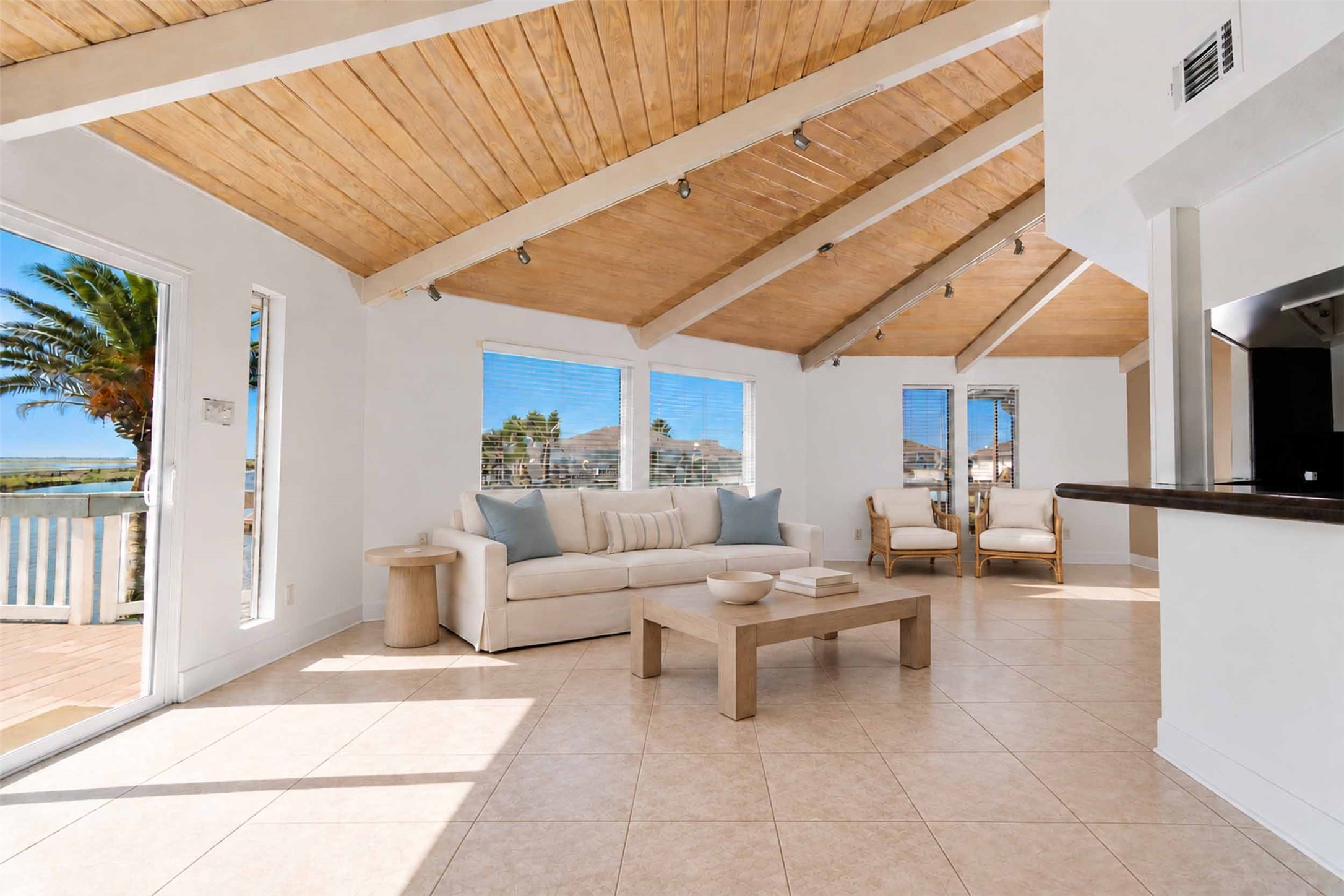 Second floor has an open living, dining, kitchen with gorgeous wood ceiling and incredible views.
