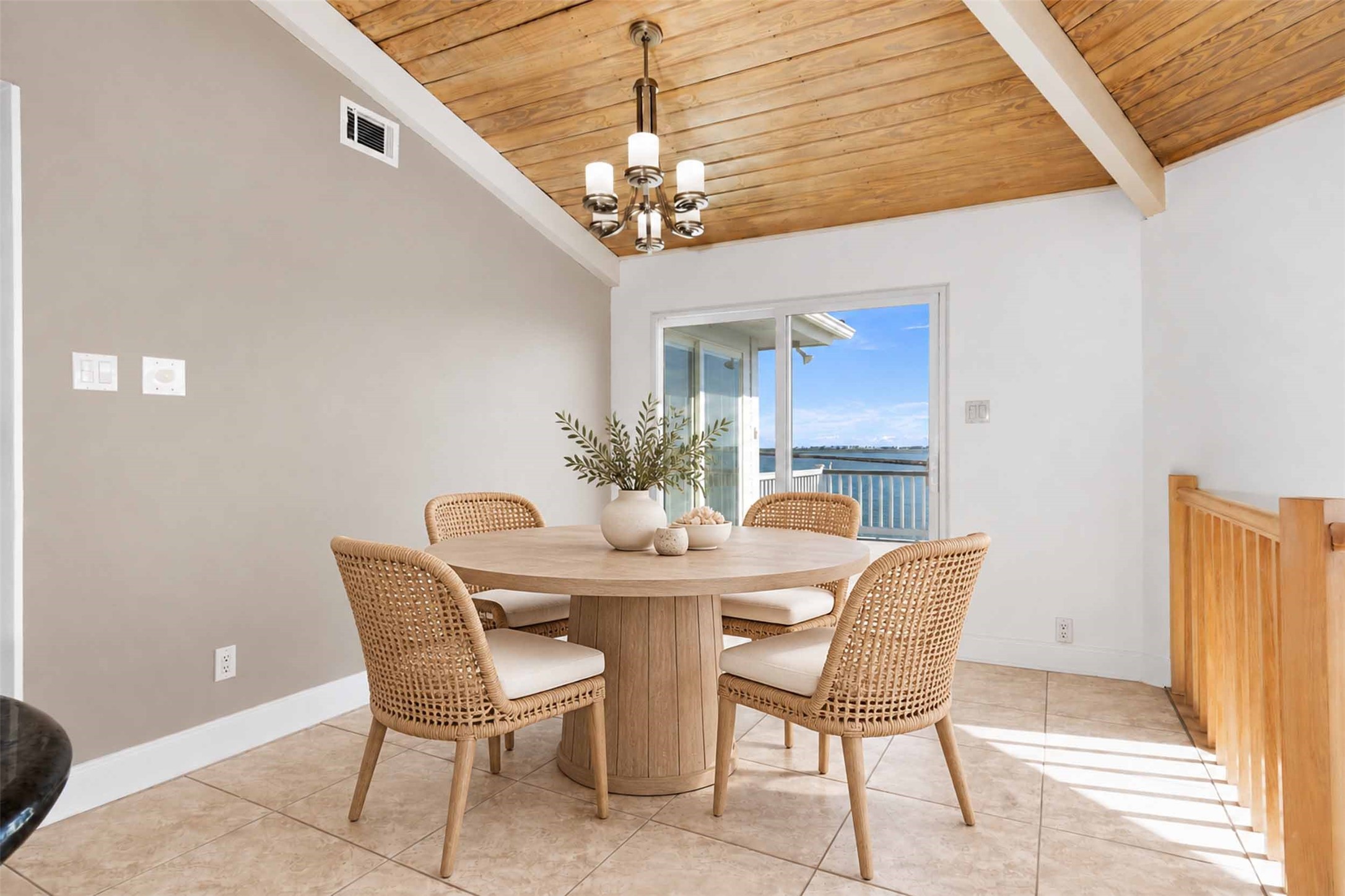 Second floor dining area has a French door with great views!