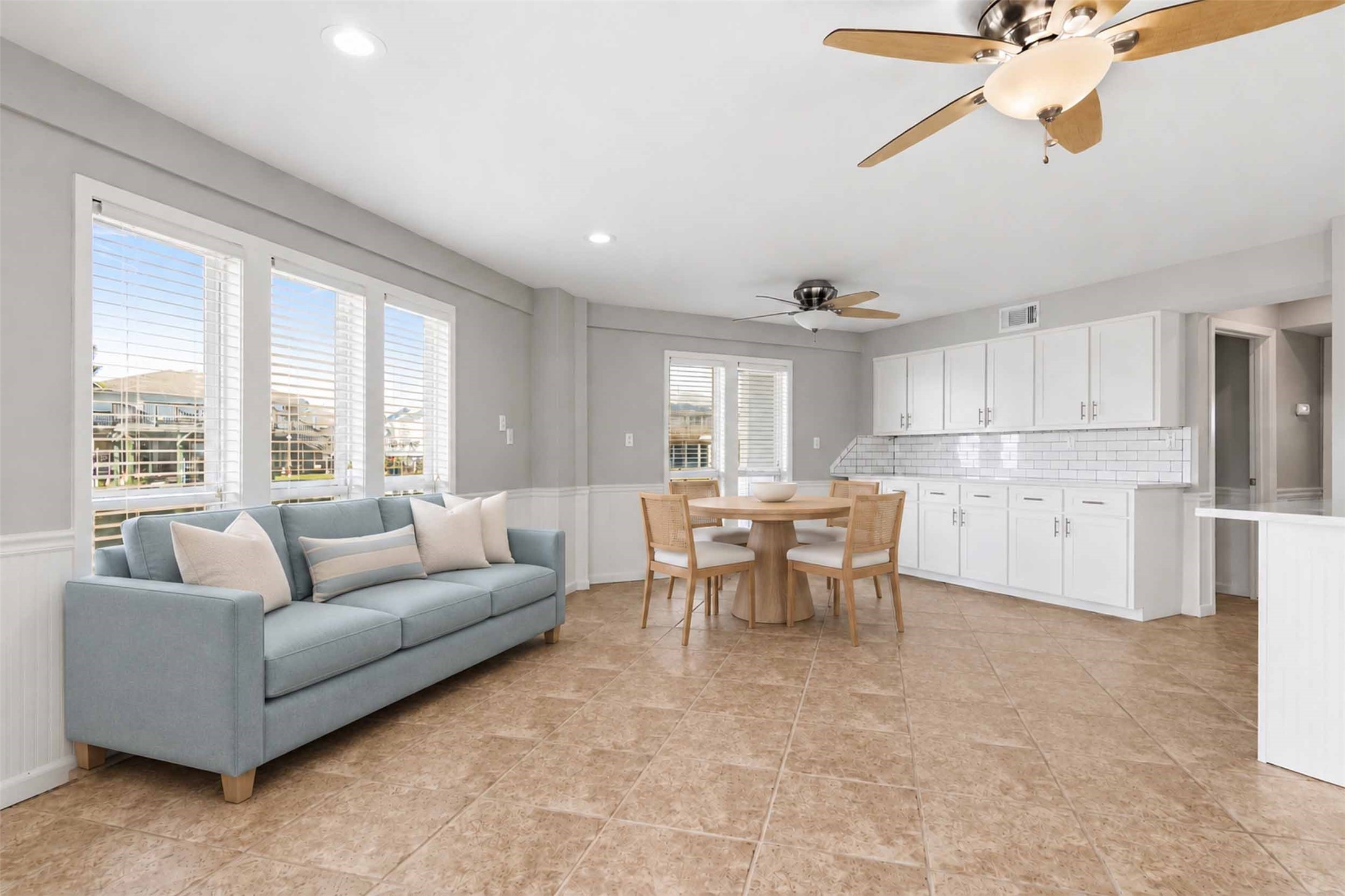 Lovely tile floors and Gorgeous cabinets.