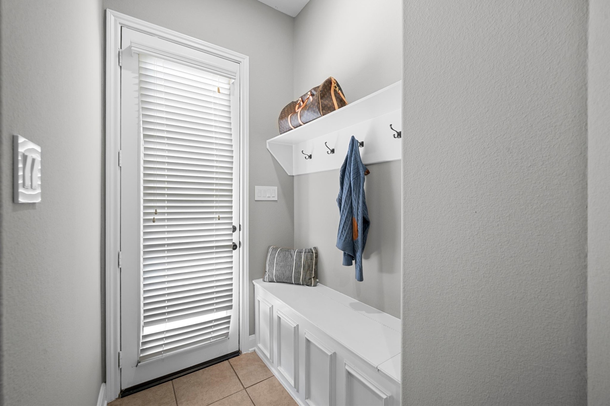 The second mudroom offers access to the backyard.