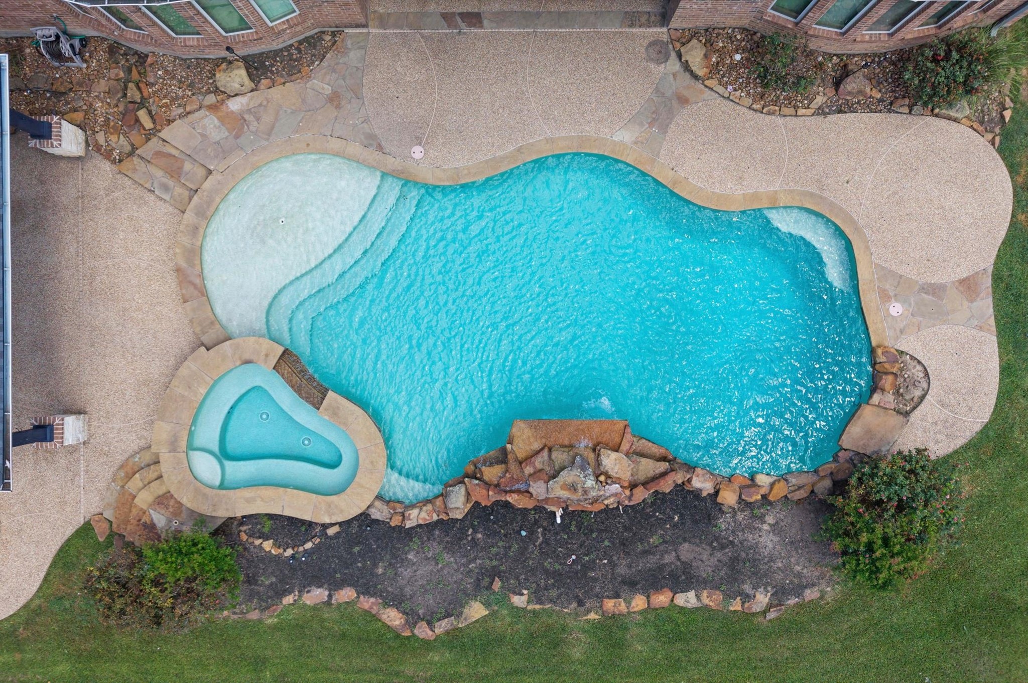 An overhead view shows the space behind the waterfall to add your favorite foliage and colors.