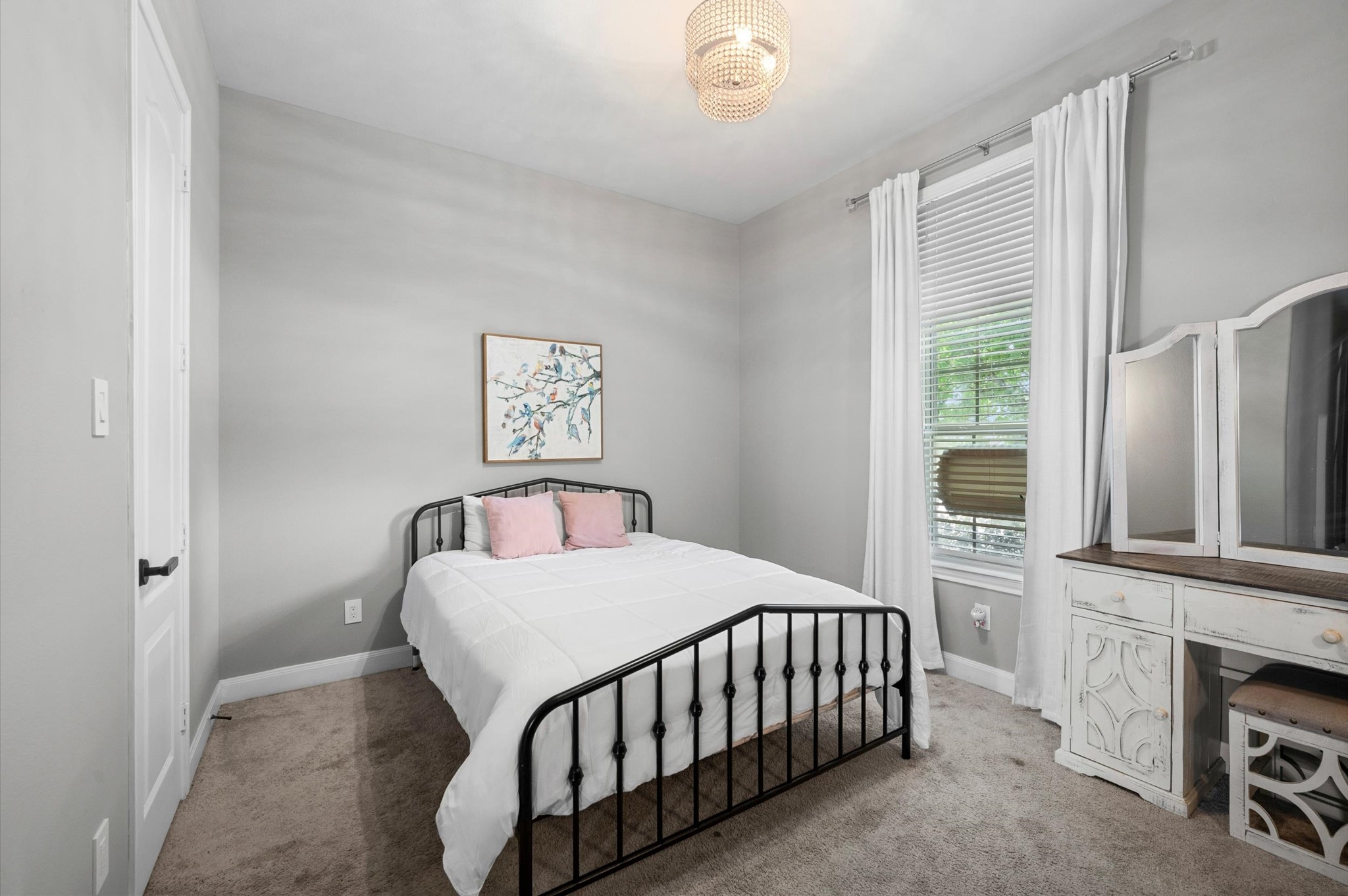 Bedroom 3 faces the front of the home. It's the perfect location for any family member.