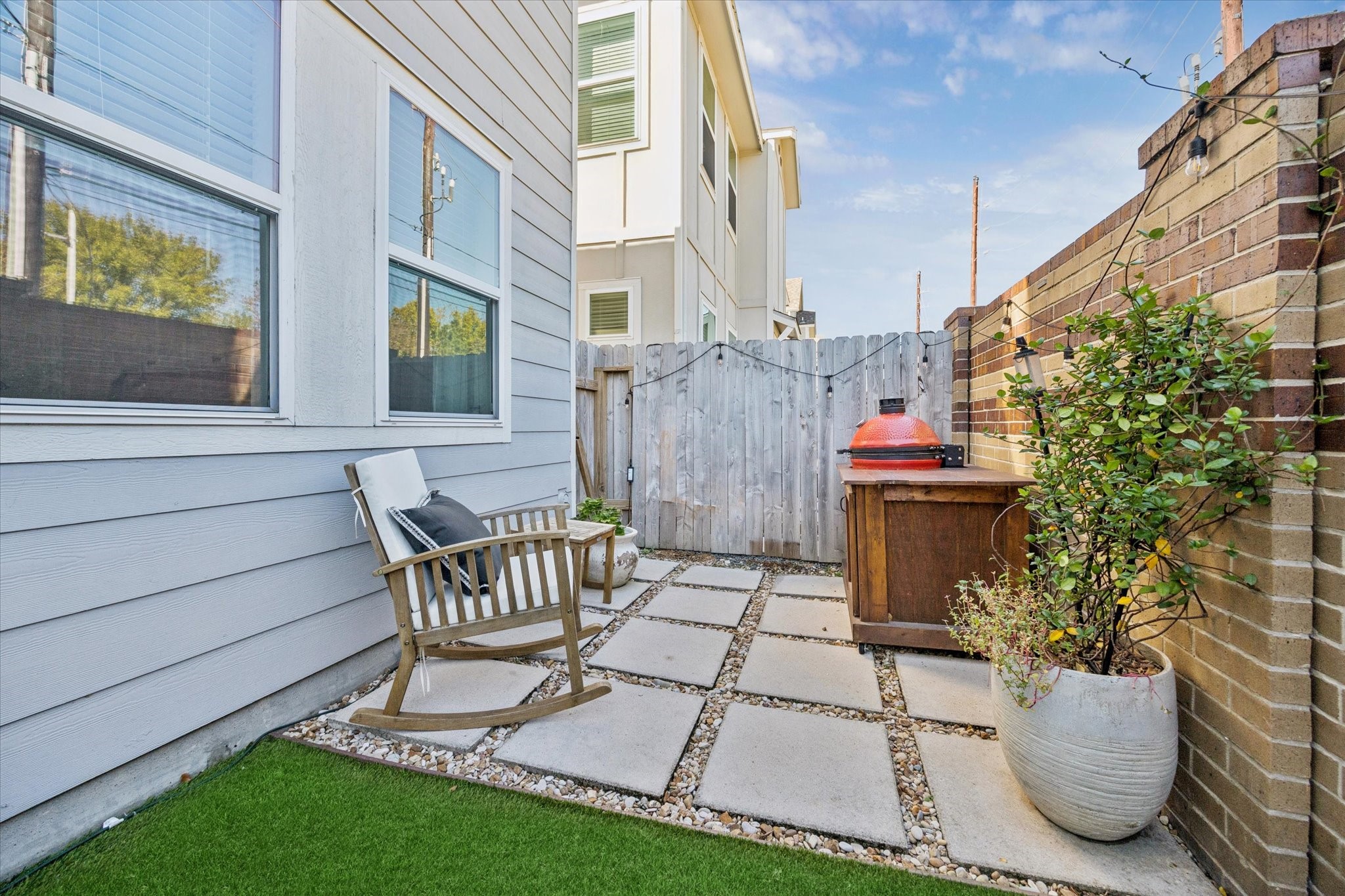 Relax, entertain, and unwind in your charming backyard.