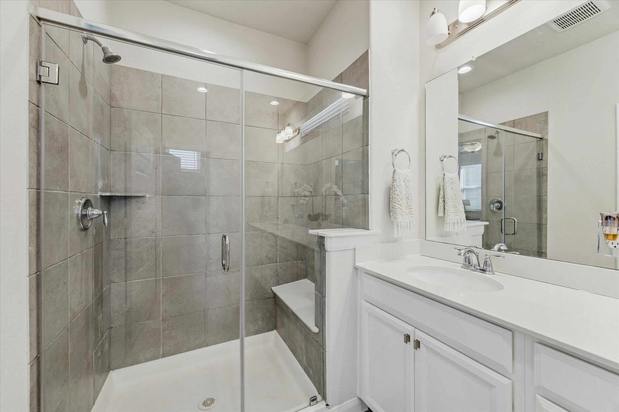 A spa-inspired primary bath with thoughtful details throughout.