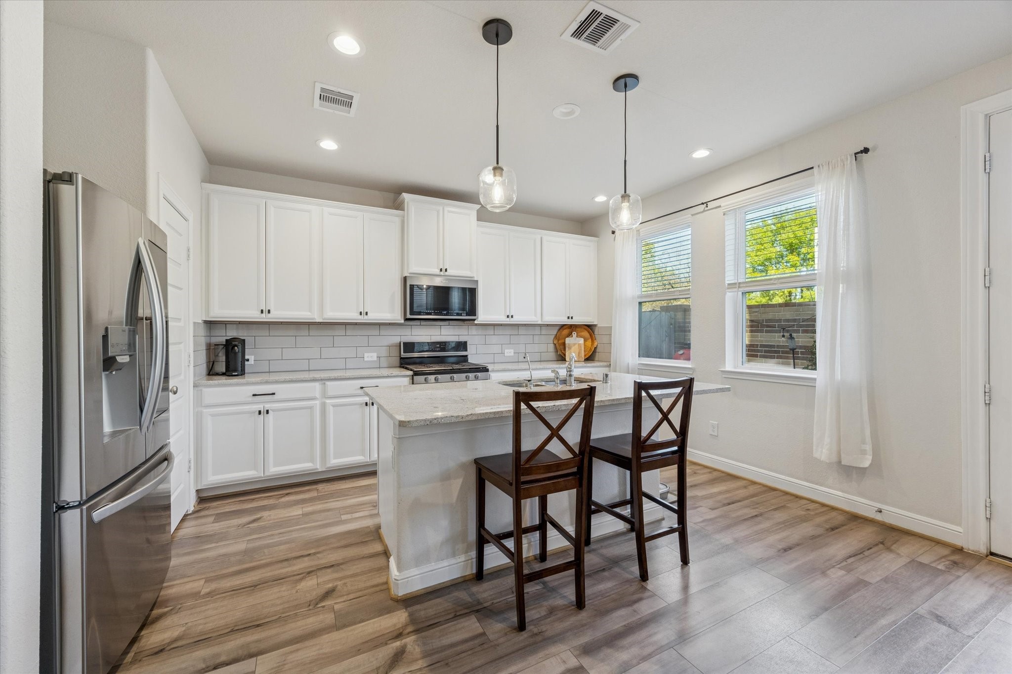Ample counter space and cabinetry make cooking a joy.