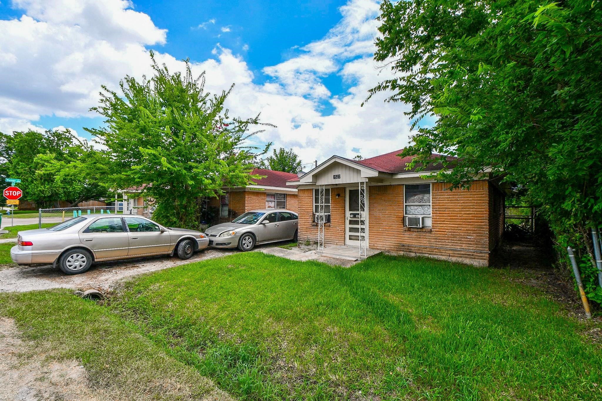 Check out this multi-family property portfolio with brick exterior and window units.