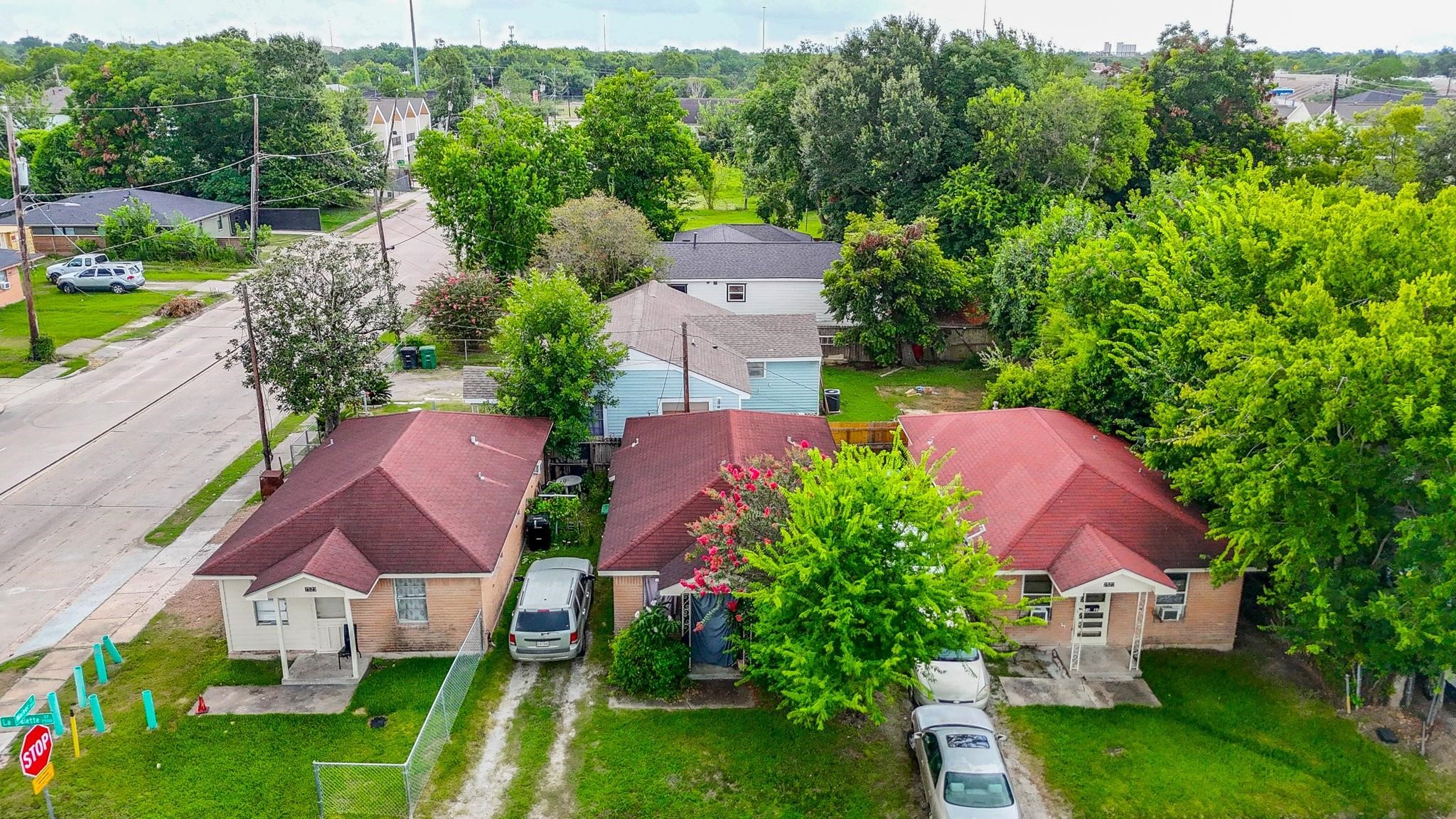 Income producing detached triplex.