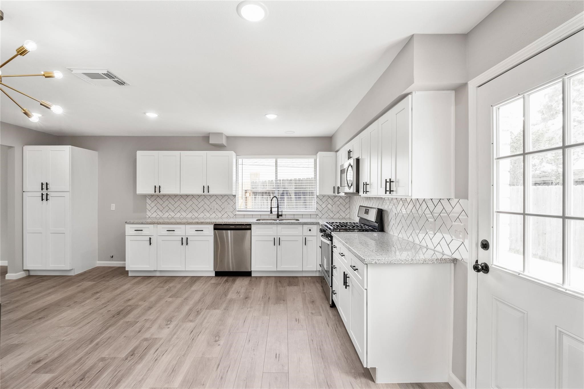 The kitchen has been completely transformed with stylish updates throughout. The kitchen has been completely transformed with stylish updates throughout.
