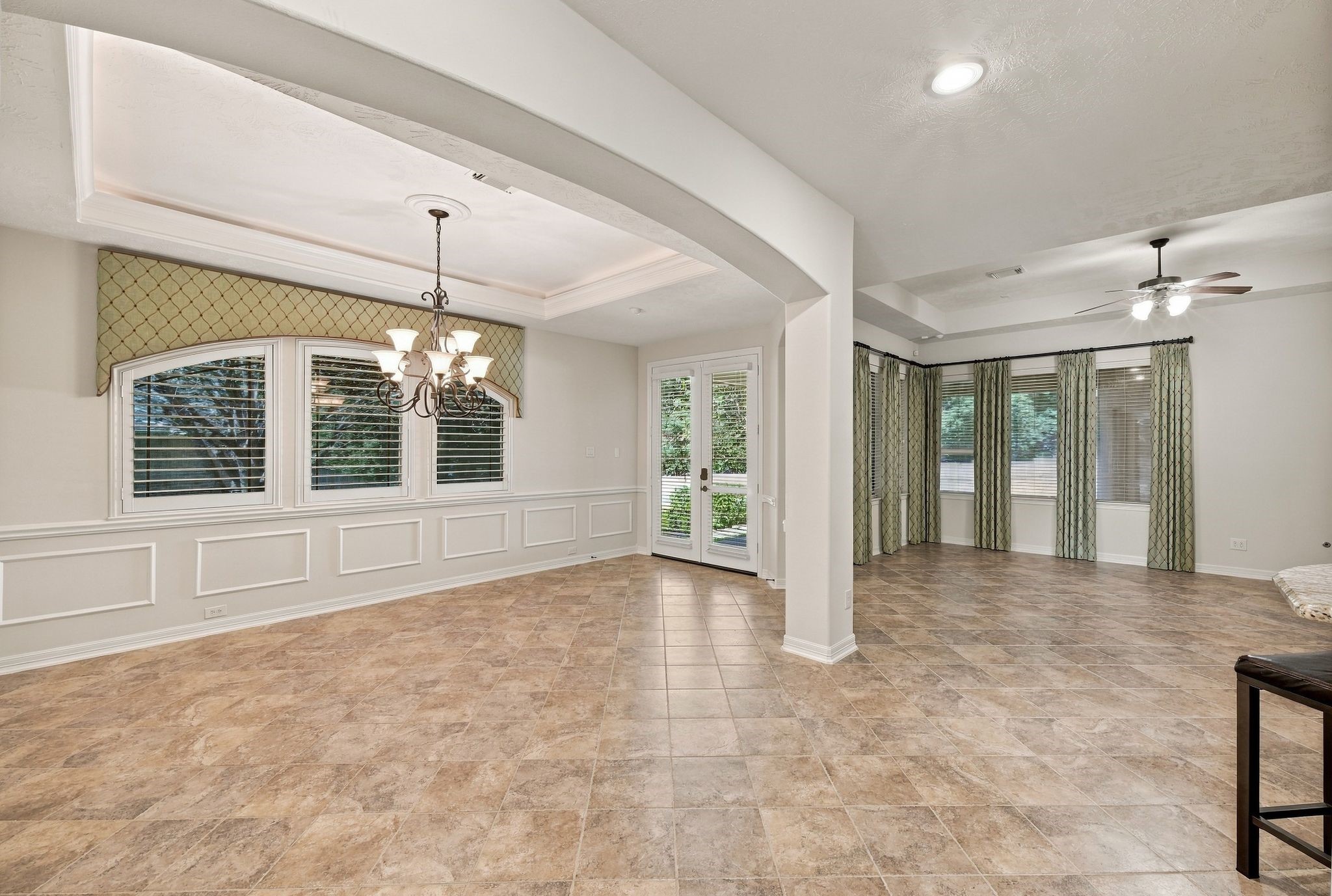 Dining Room with Living Room directly ahead and Kitchen to the right Dining Room with Living Room directly ahead and Kitchen to the right