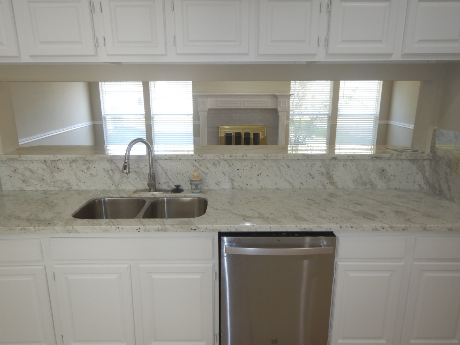 The kitchen with views of the family room The kitchen with views of the family room