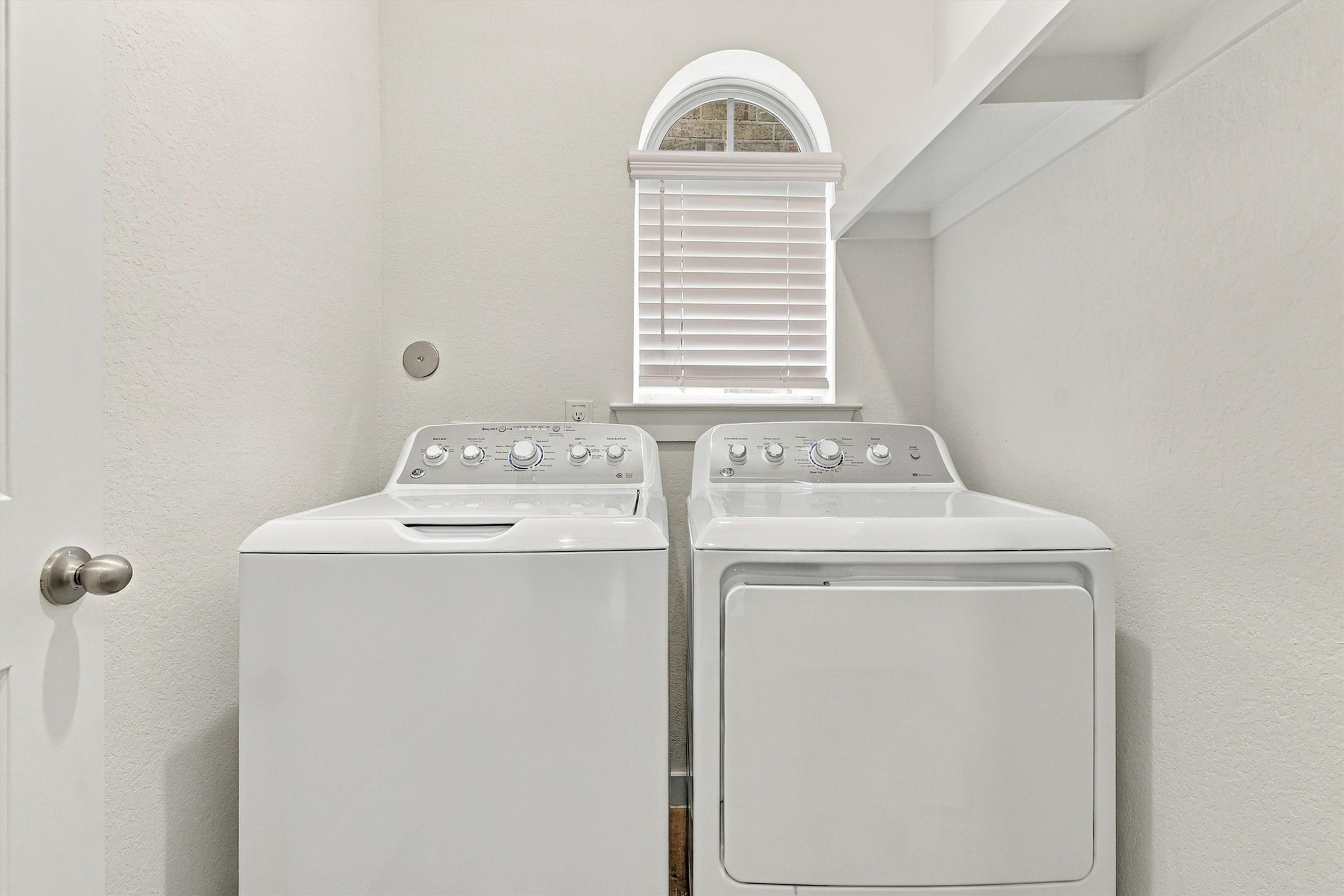 Laundry room with window and built-in shelf!