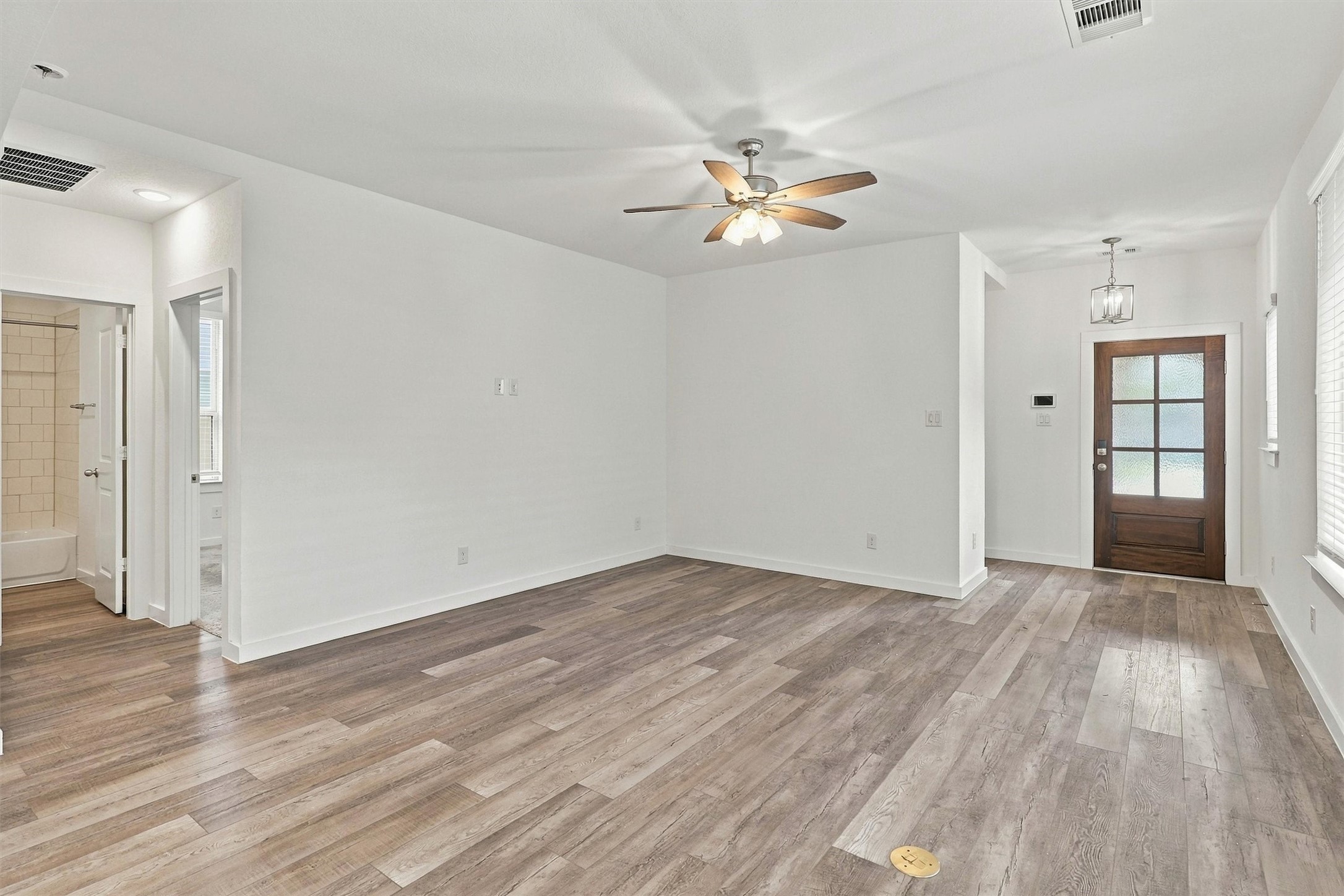 To the left of the living room, find two secondary bedrooms and a full bath!