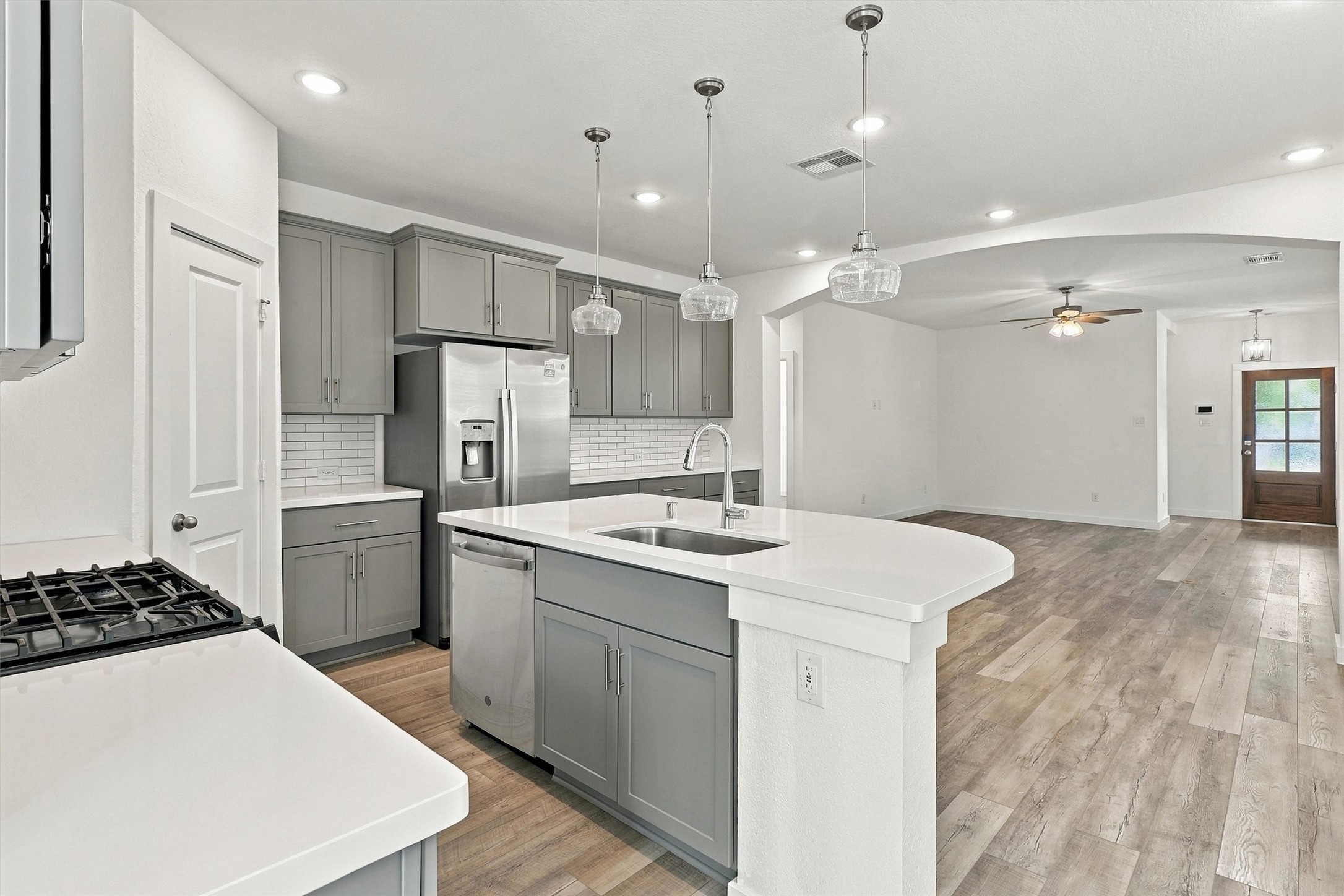 Kitchen is open to the dining and living area.