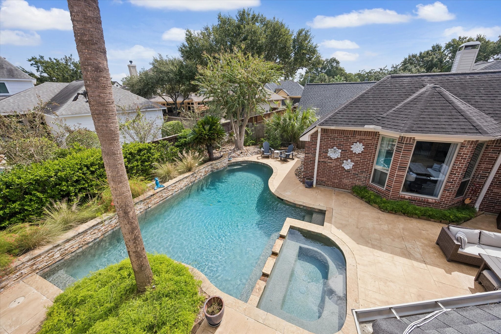 Spend afternoons in the sparkling pool, unwind in the spa, or enjoy the beautifully landscaped surroundings. Behind the scenes, a whole-house generator provides added preparedness during unexpected power outages.