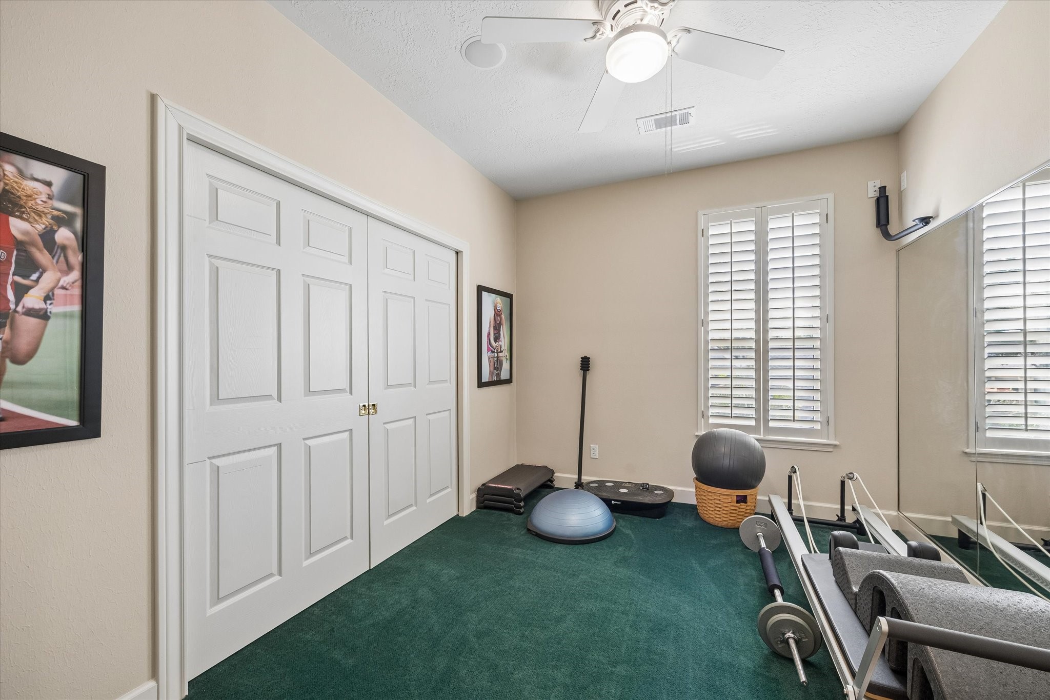 Skip the gym membership and enjoy the convenience of a dedicated workout space right at home, with room for your favorite fitness equipment.
