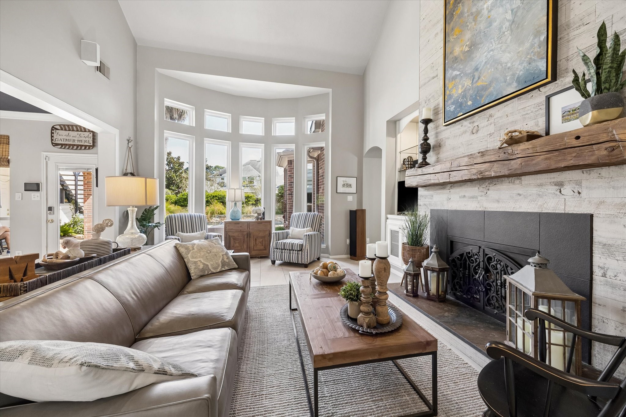 Whether you're hosting a houseful of friends or enjoying a quiet evening at home, this generous family room offers space for everyone to get comfortable. Beautiful architectural accents and an easy connection to the kitchen make gathering effortless.