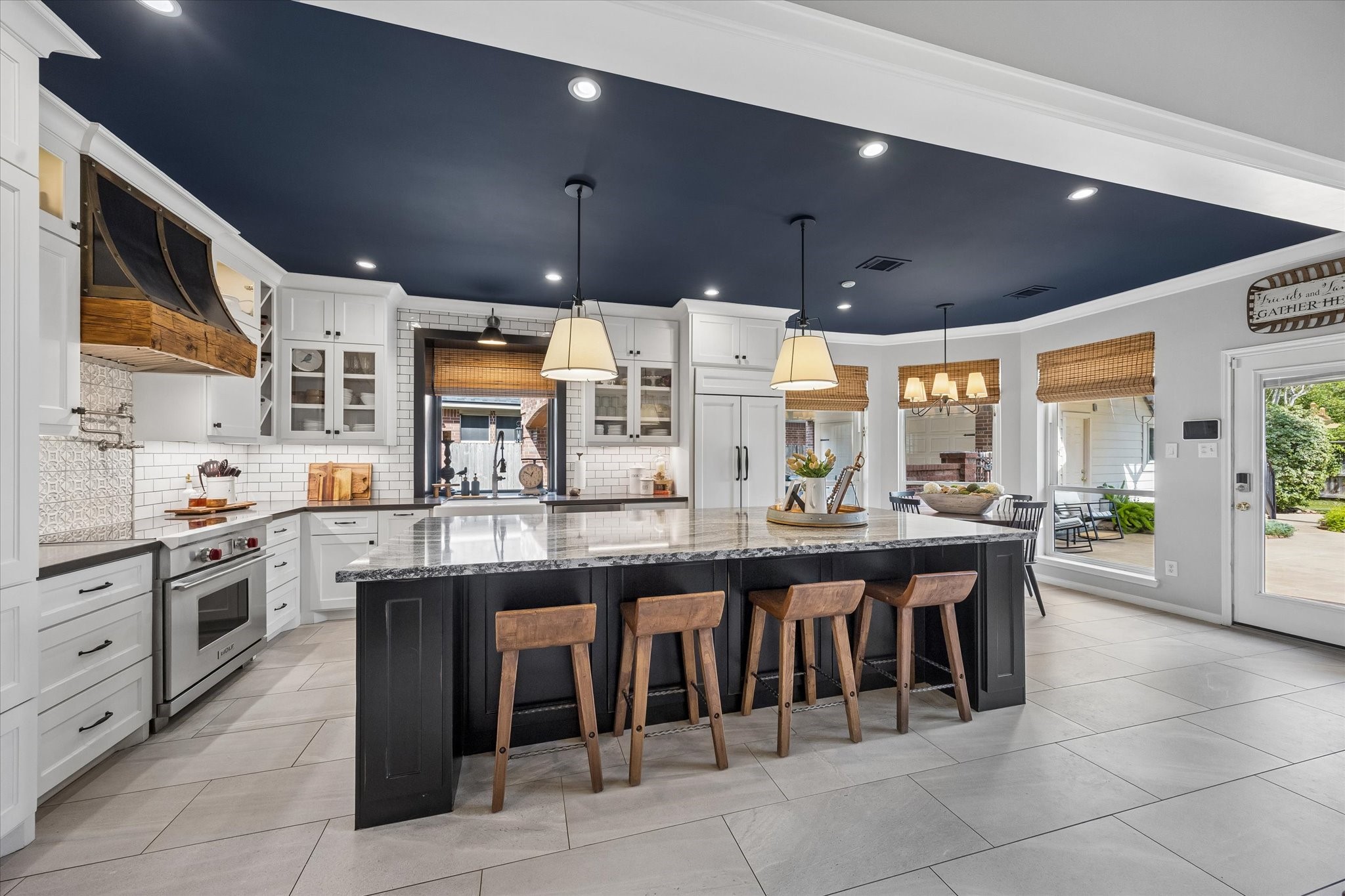 Morning coffee, after-school conversations, or appetizers with friends, this impressive 10-foot island is destined to become everyone's favorite gathering place. Quartz countertops and generous built-in storage make it as practical as it is beautiful.