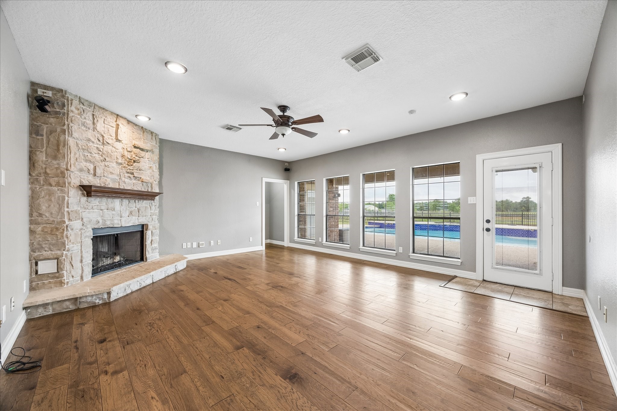 Living room overlooks the pool. Living room overlooks the pool.