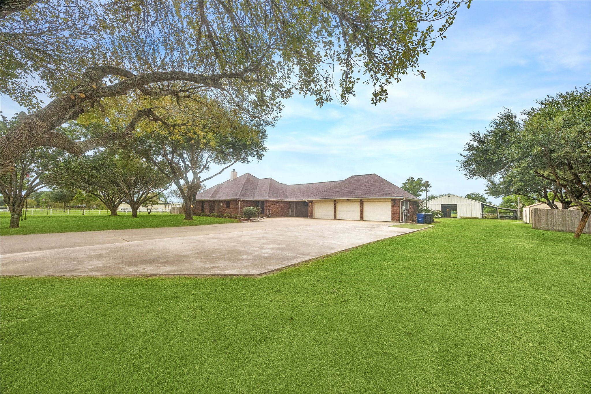 3-car garage with extra parking. 3-car garage with extra parking.