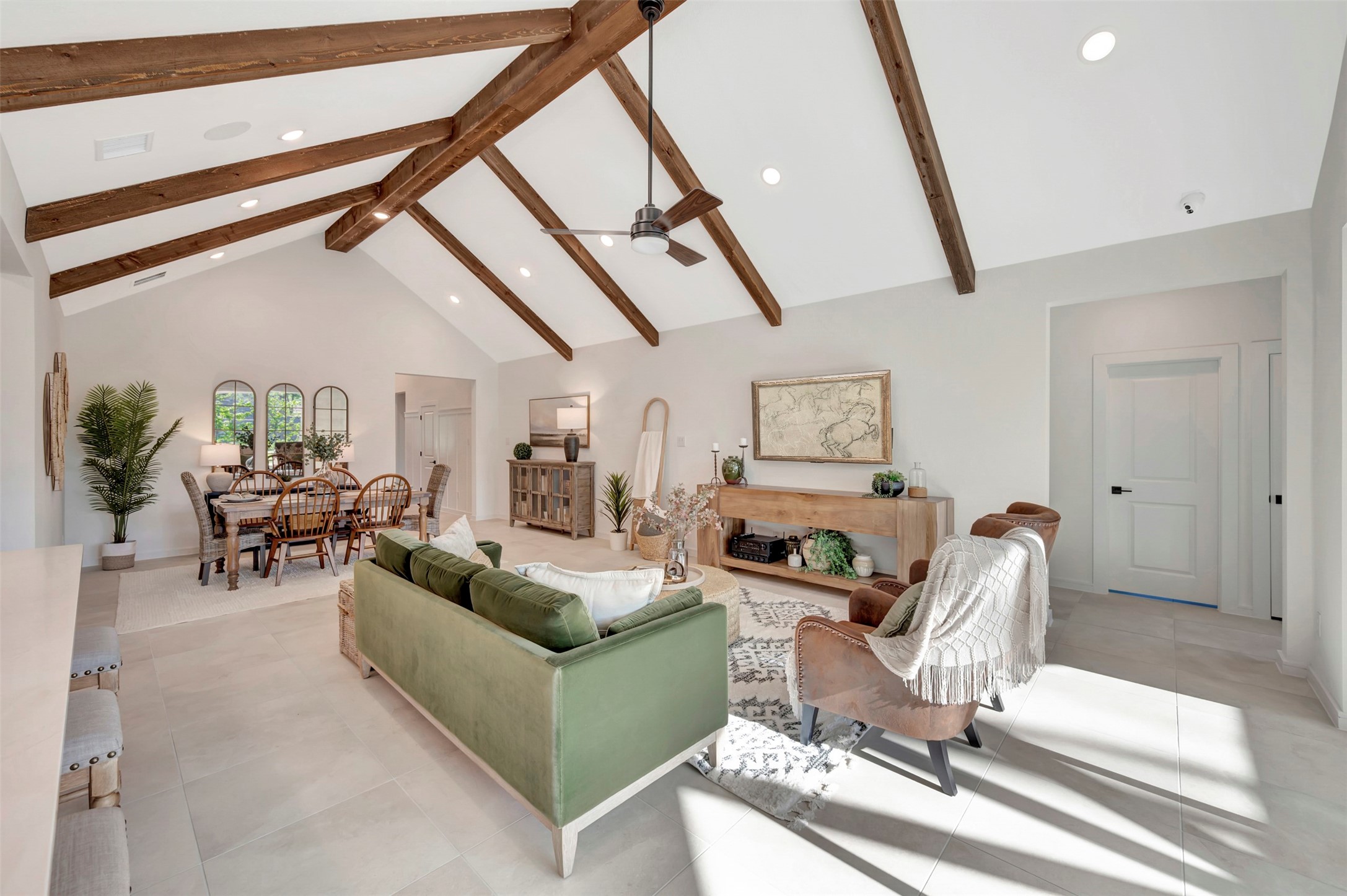 Open living area with vaulted ceilings (*Photo not of actual home and used for illustration purposes only.)